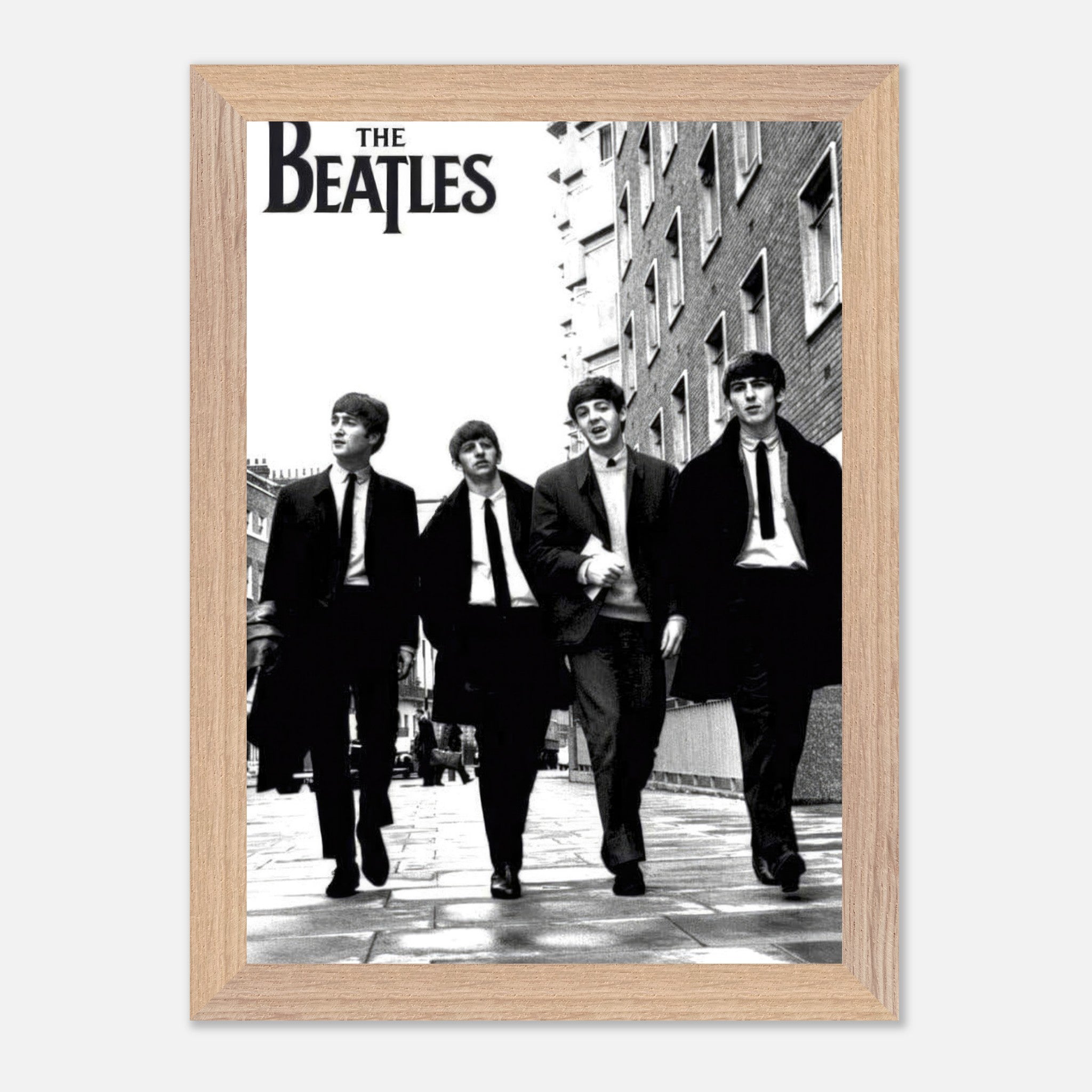 The Beatles vintage framed print, featuring iconic black and white photo of the band walking together.