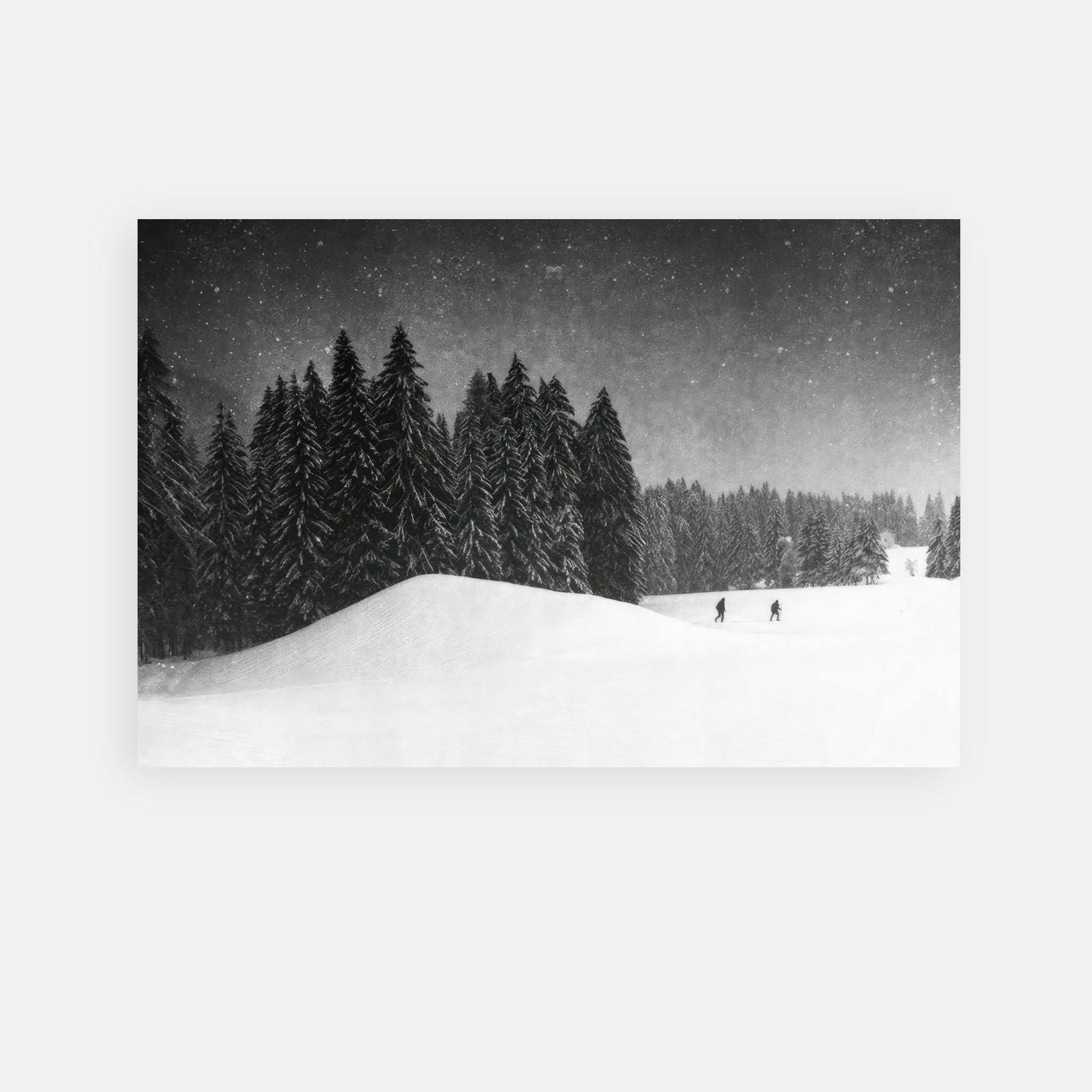 Winter Crossing metal print depicting two figures in a snowy landscape with evergreen trees in black and white.