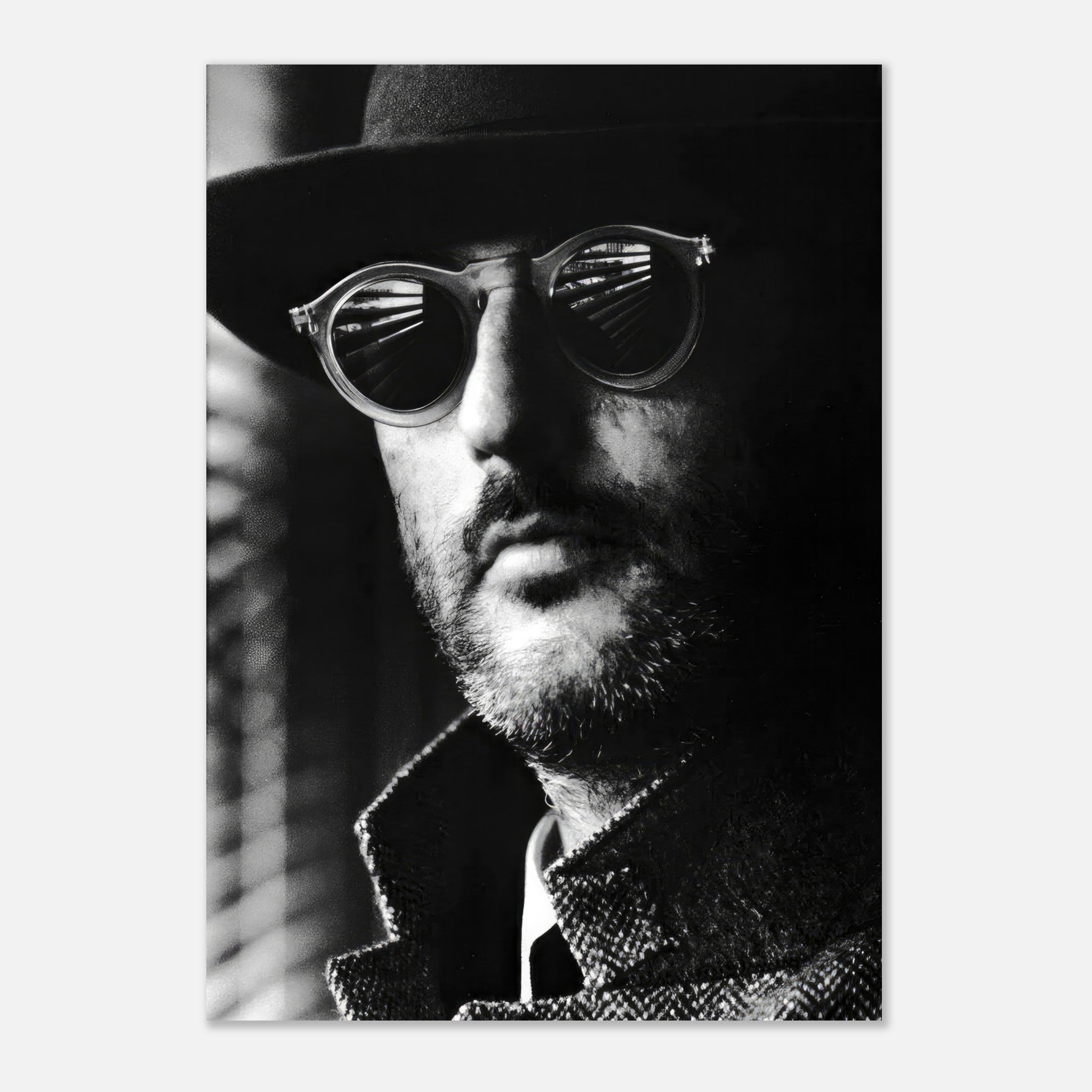 Jean Reno Leon photography poster featuring a striking black-and-white portrait with reflective sunglasses.