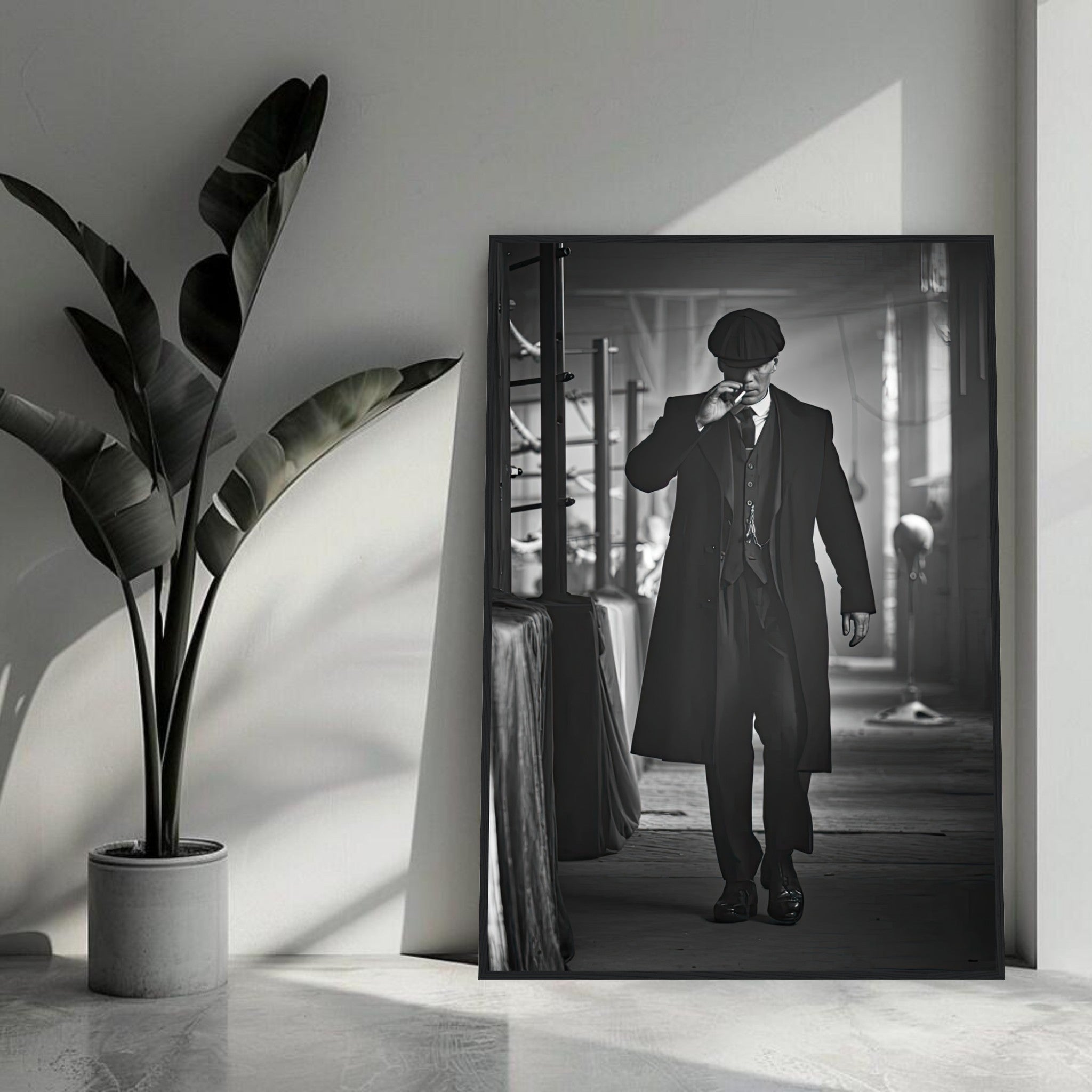 Tommy Shelby framed print from Peaky Blinders, showcasing 1920s style with flat cap and tailored coat.