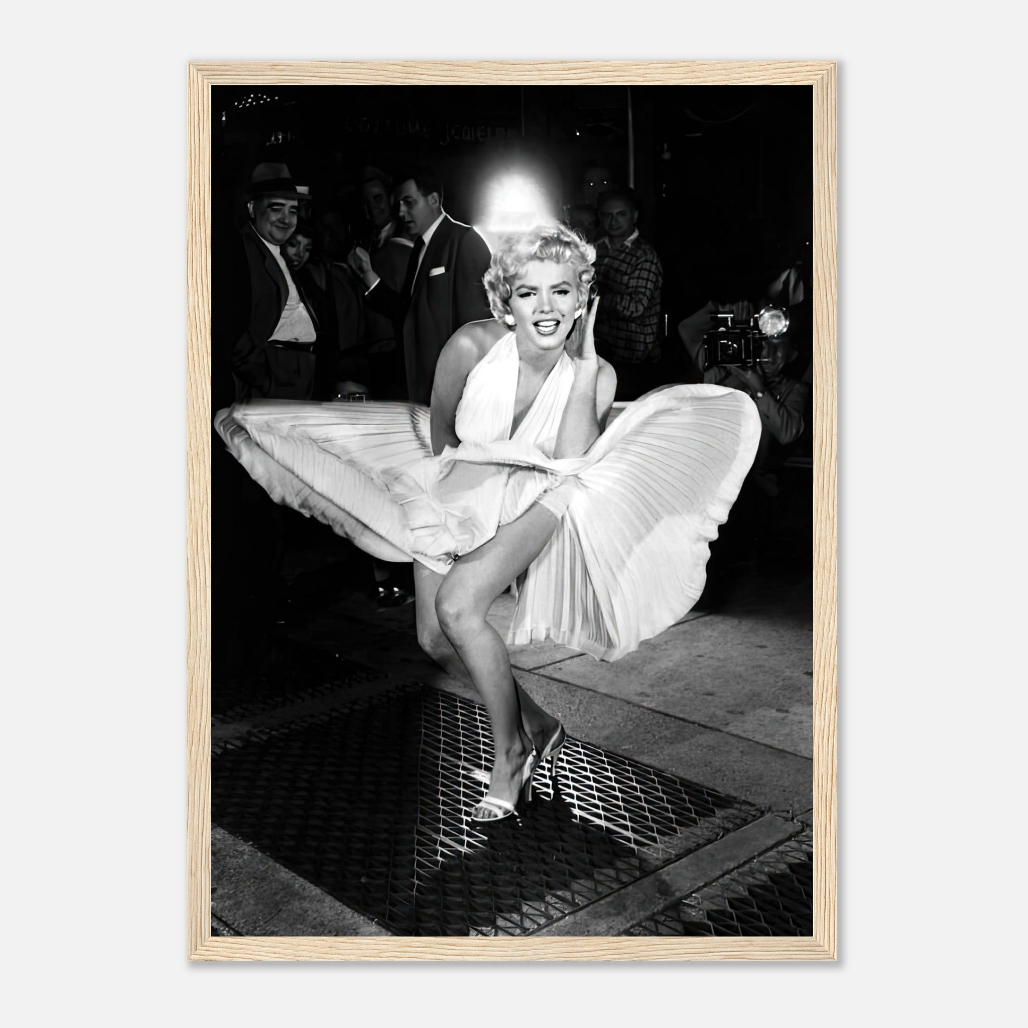 Marilyn Monroe in white dress, iconic wind-blown moment from The Seven Year Itch, framed print showcasing Hollywood glamour.