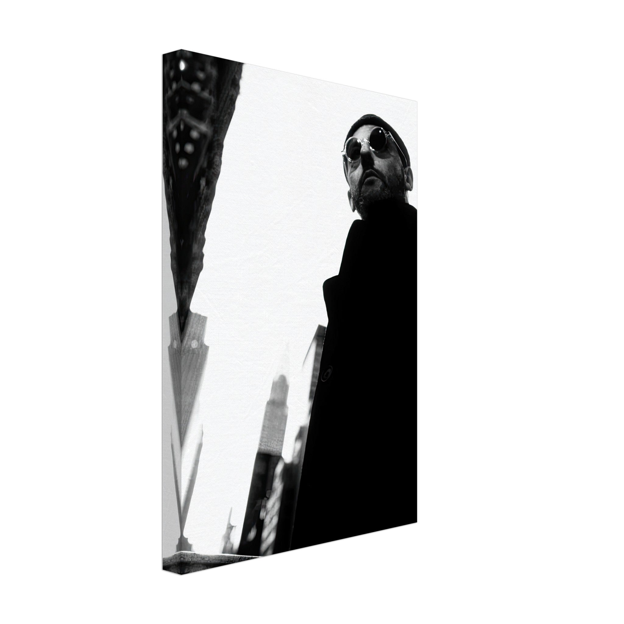Black-and-white canvas of Jean Reno standing in an urban setting, showcasing sophistication and charisma.