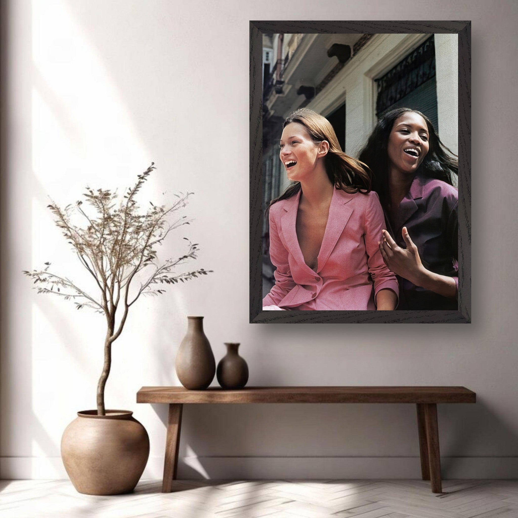 Naomi Campbell and Kate Moss Vintage Framed Print in a stylish living room setting.