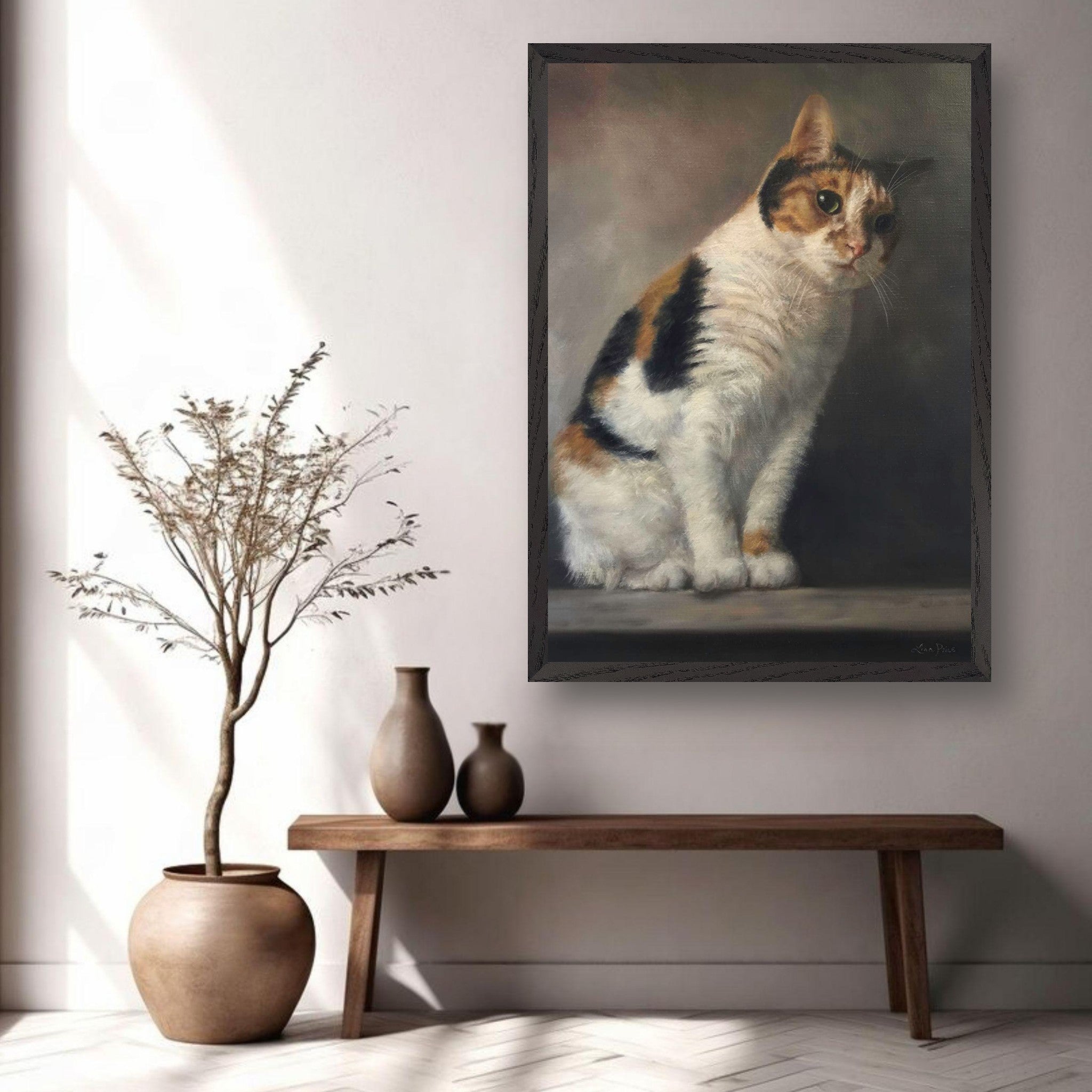 Realistic cat portrait painting displayed in a modern home decor setting with a minimalistic vase.