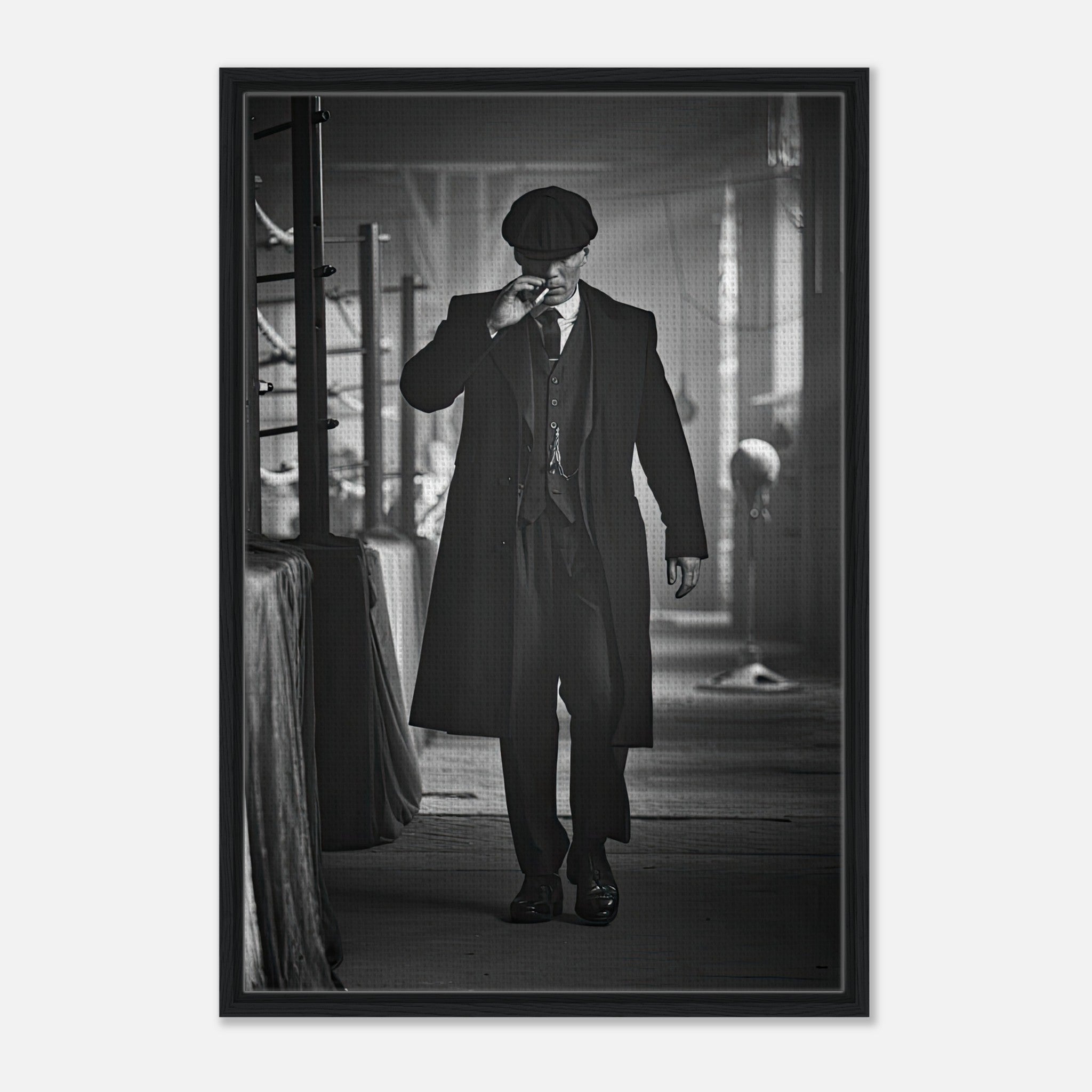 Tommy Shelby from Peaky Blinders framed canvas print in monochrome, showcasing iconic style and commanding presence.