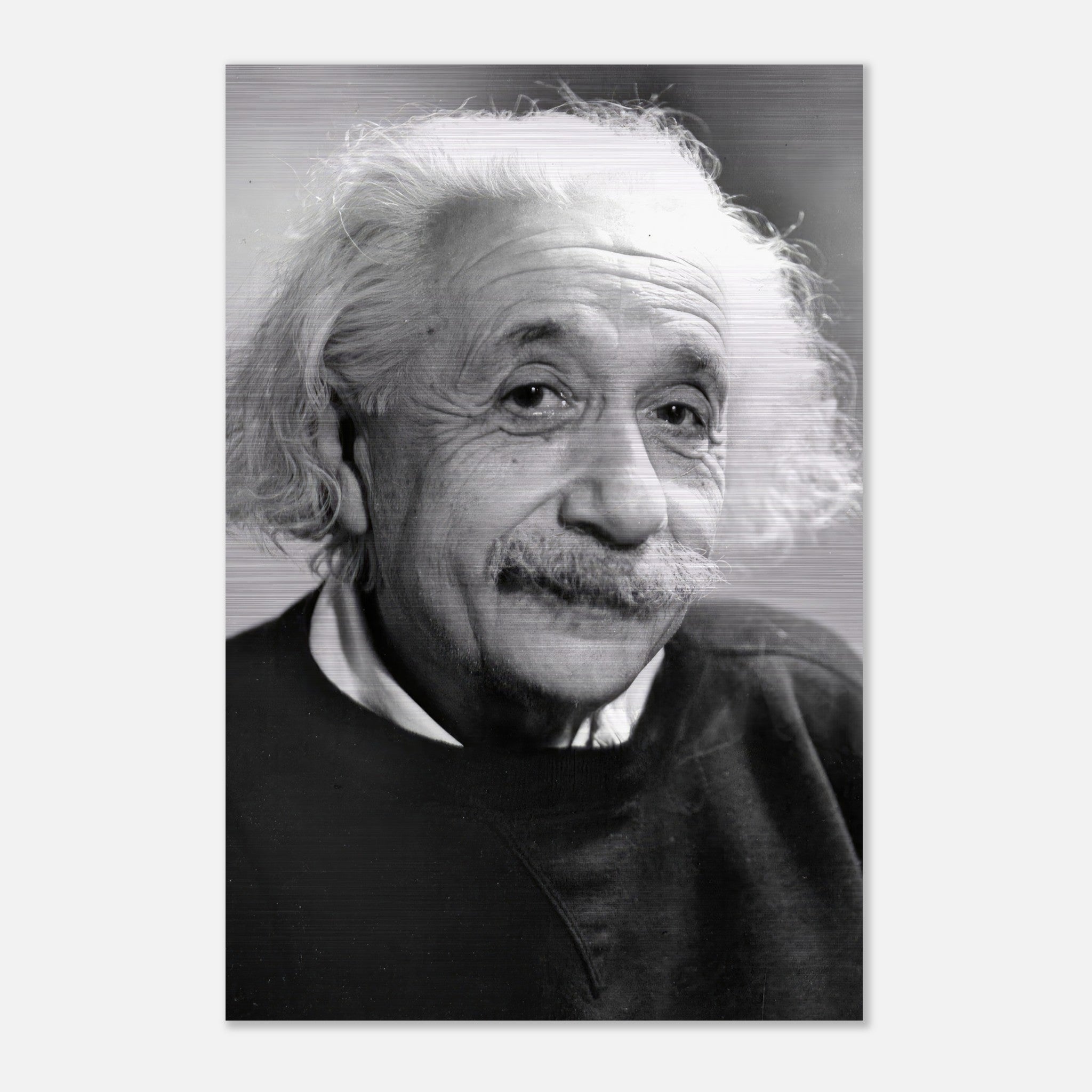 Brushed metal artwork of Albert Einstein's black and white portrait, showcasing his wisdom and charm.