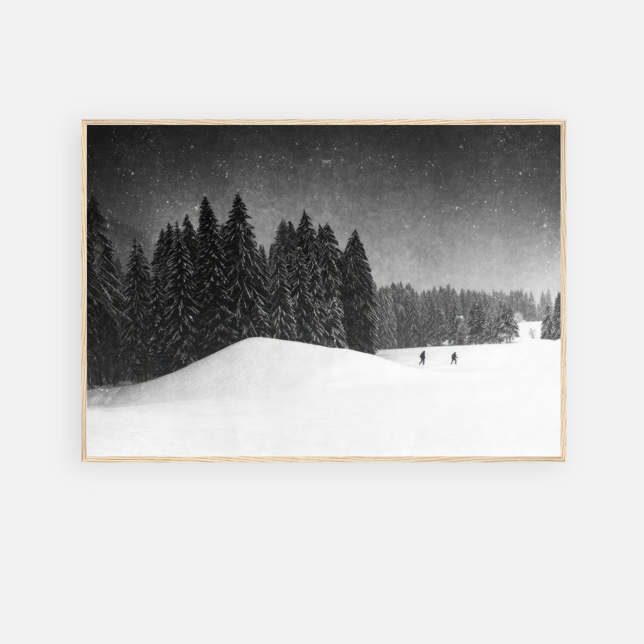 Winter Crossing framed print showcasing a serene snow-covered forest with evergreens and skiers in a tranquil winter landscape.