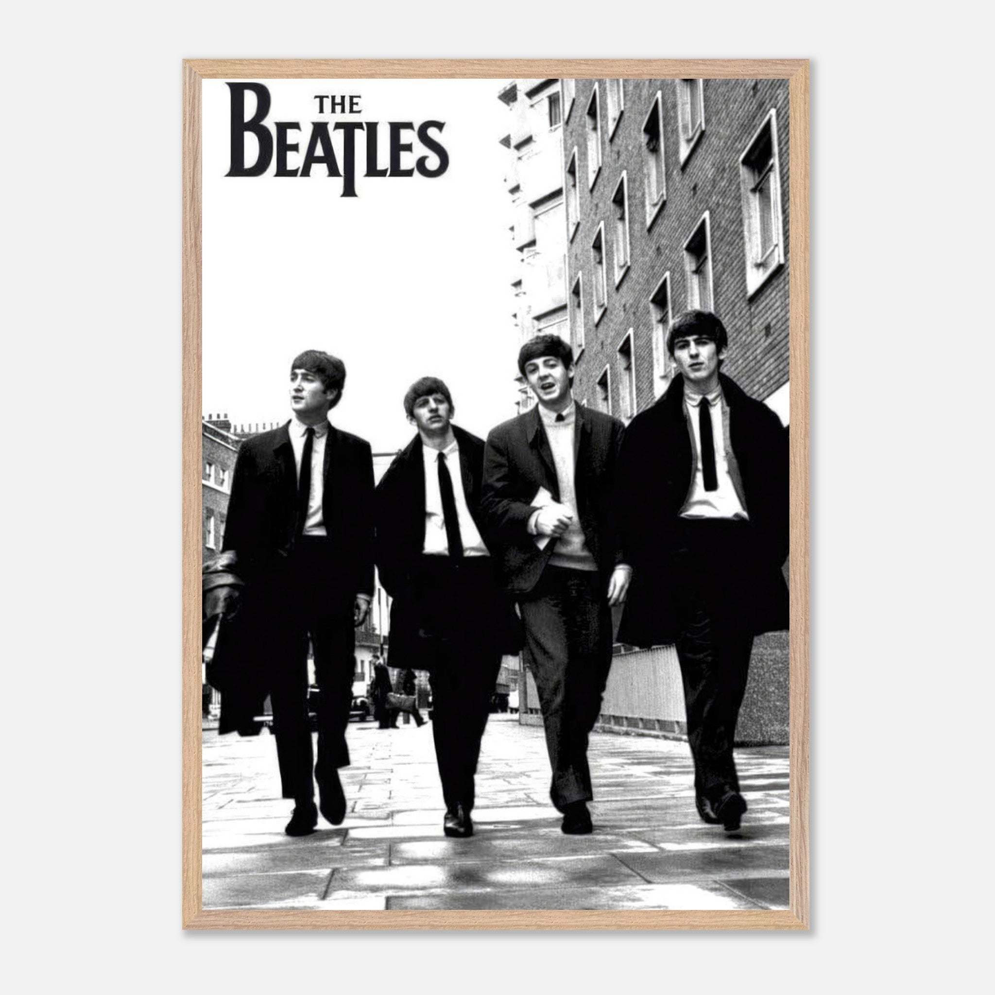 The Beatles vintage framed print showcasing the iconic band walking in black and white.