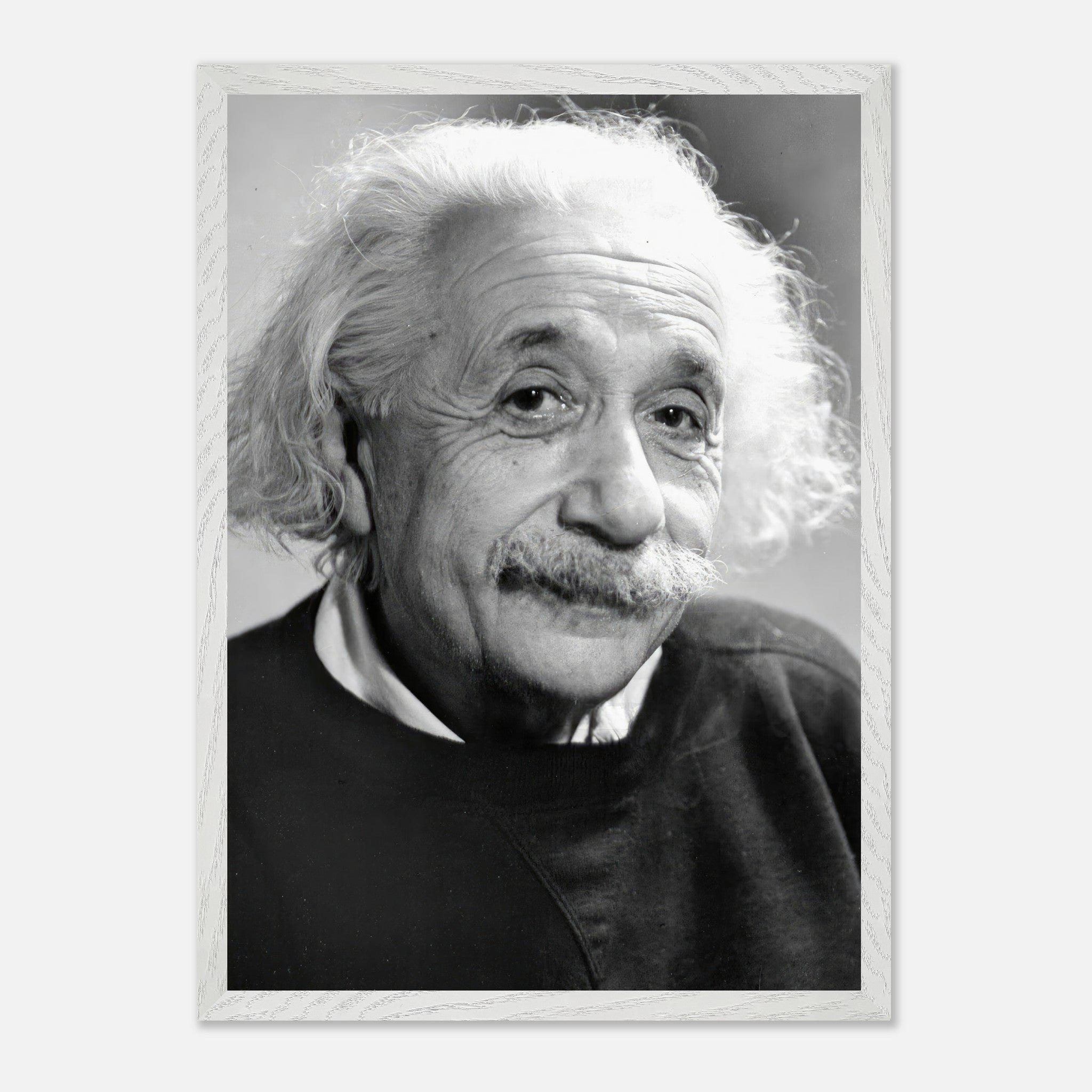 Vintage framed print of Albert Einstein from 1946, showcasing his thoughtful expression and iconic hairstyle.