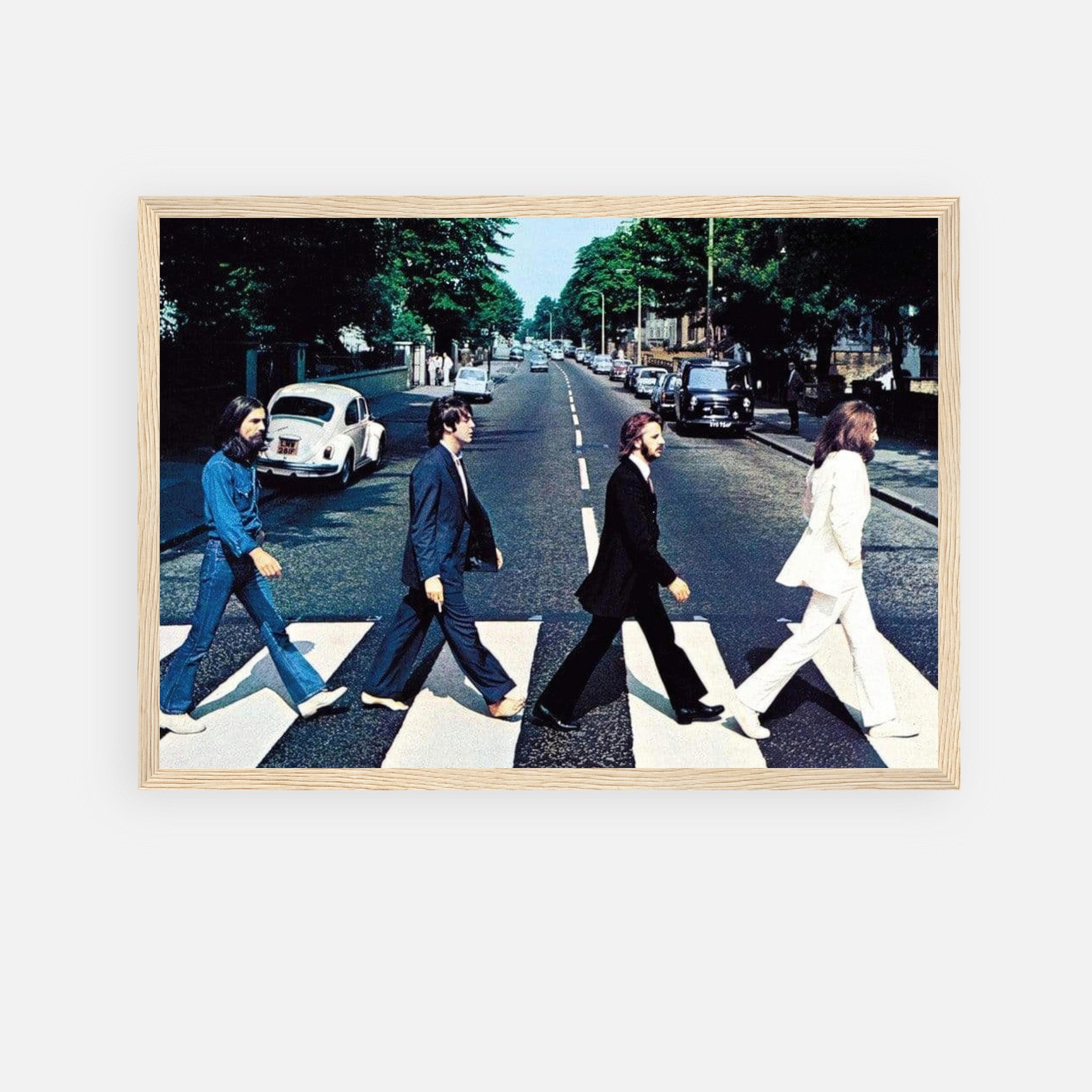 Framed print of The Beatles crossing Abbey Road, a classic music icon image, perfect for fans of the band.