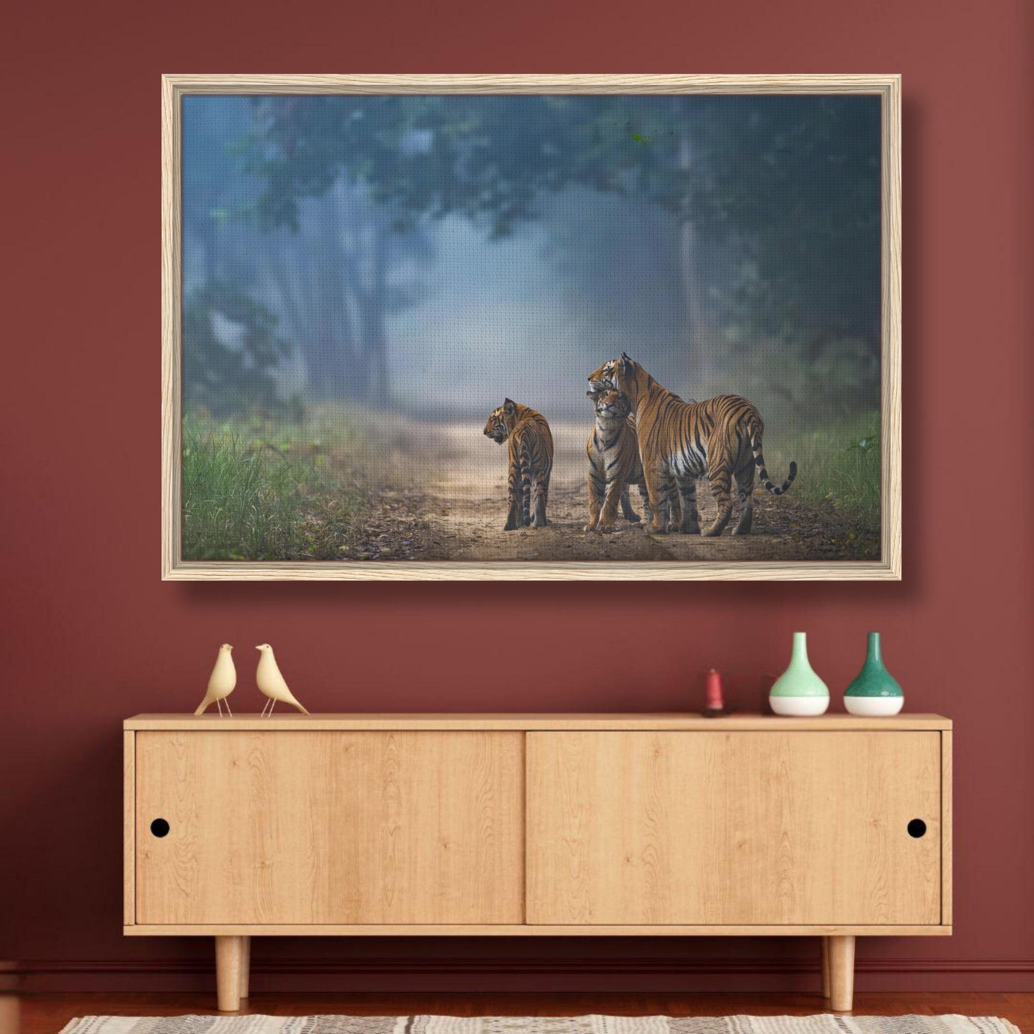 Framed canvas print of a tiger family walking through a foggy forest, showcasing vivid colors and intricate details.