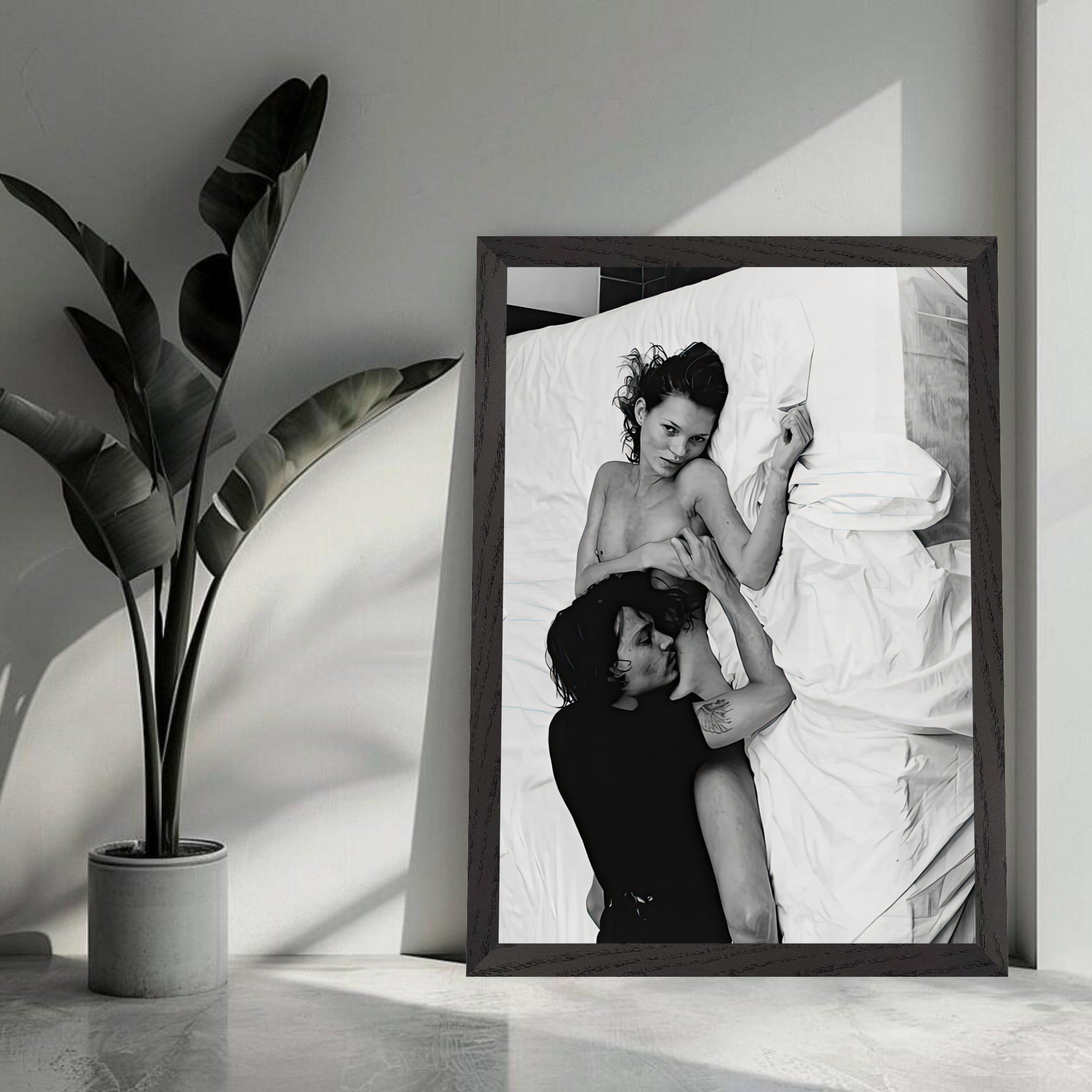 Vintage framed print of Kate Moss and Johnny Depp in black-and-white, capturing 90s romance and style.