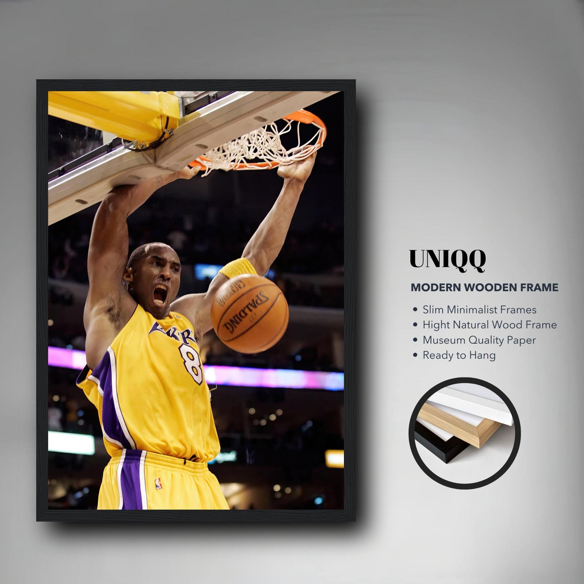 Kobe Bryant's iconic slam dunk framed print in Lakers colors, showcasing his athleticism and determination.