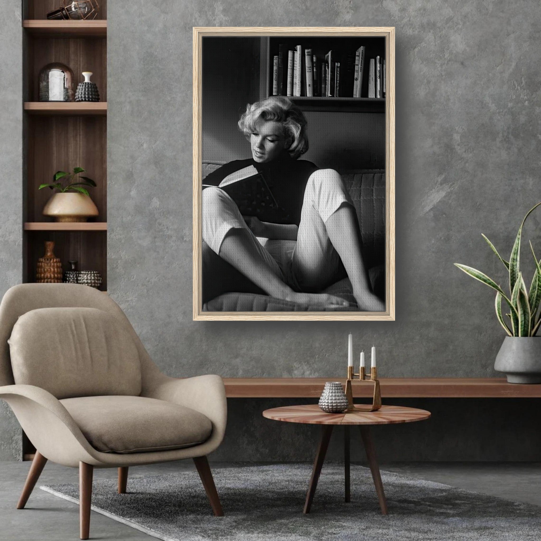 Marilyn Monroe reading at home, framed black-and-white canvas art in sophisticated living room decor.
