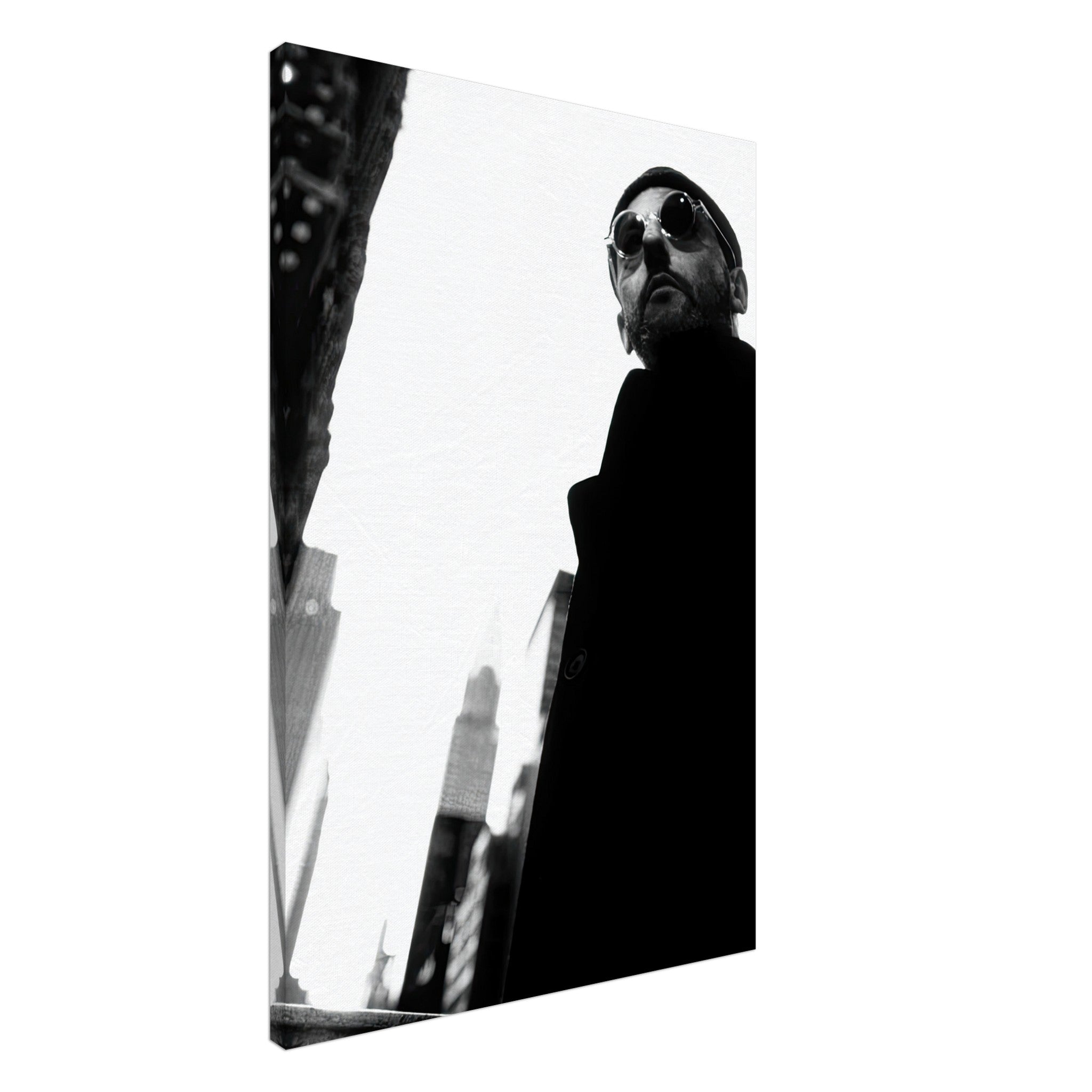 Leon Photography - Jean Reno Canvas in black-and-white, showcasing urban architecture and charismatic presence.