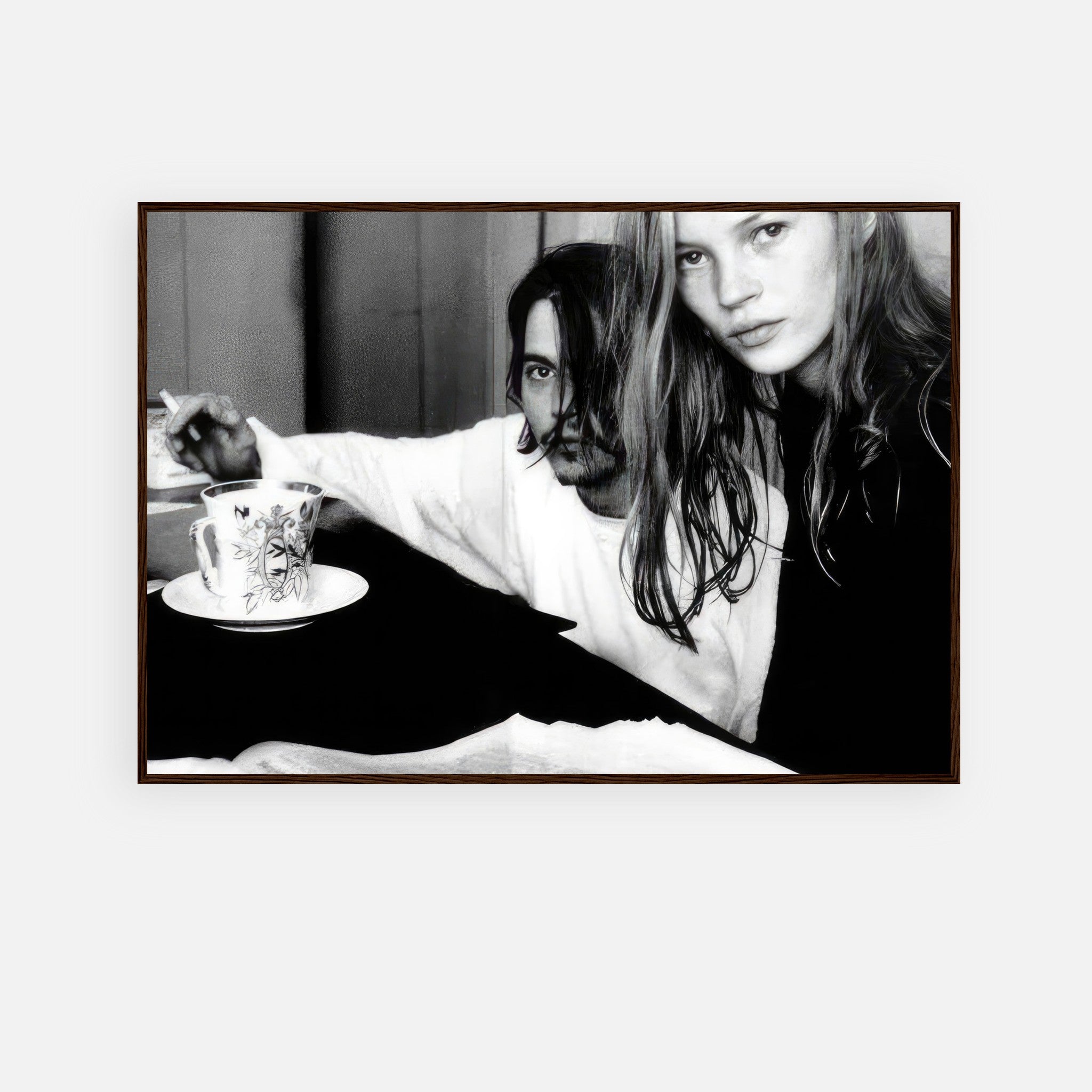 Framed print of Johnny Depp and Kate Moss in black and white, capturing their 1990s romance.
