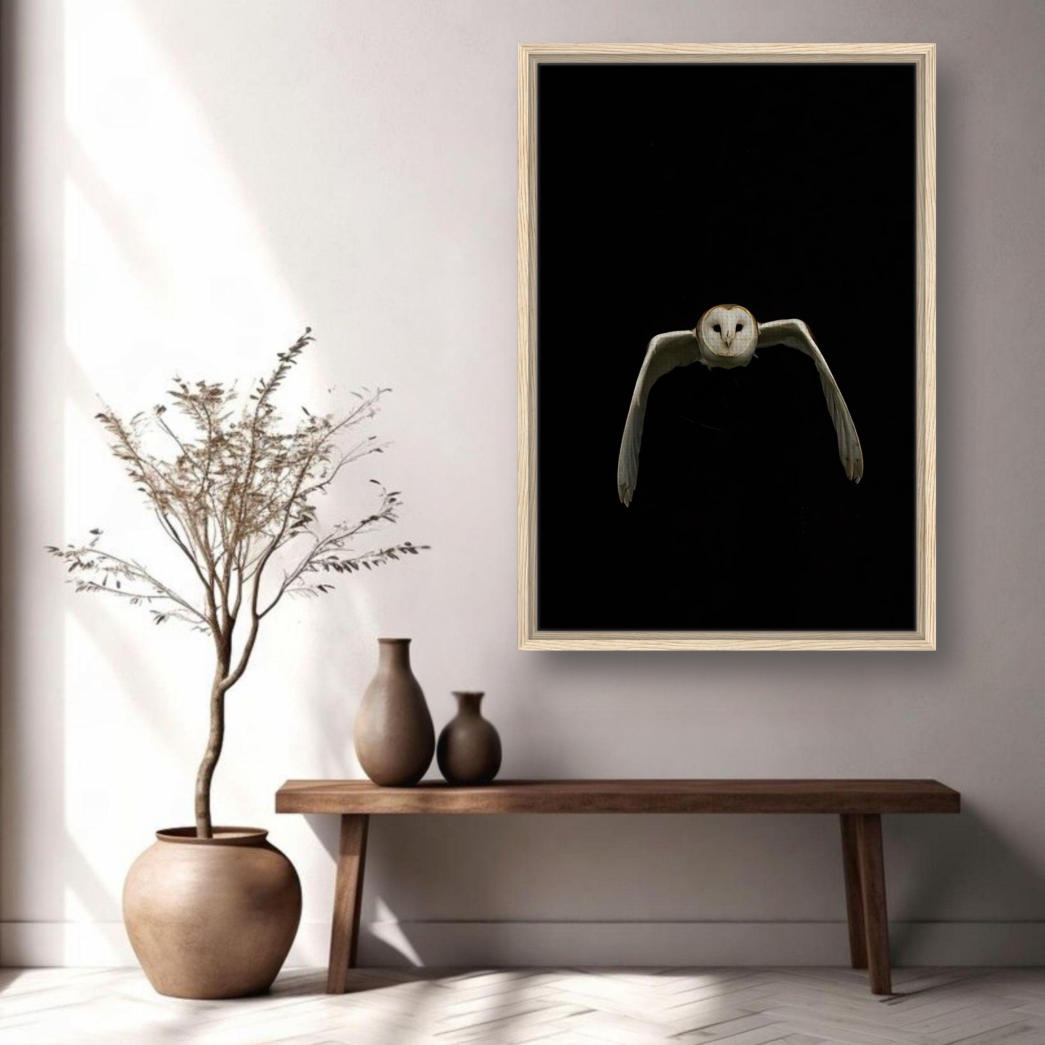 Owl Framed Canvas artwork featuring a majestic owl in flight against a black backdrop, enhancing elegant room decor.