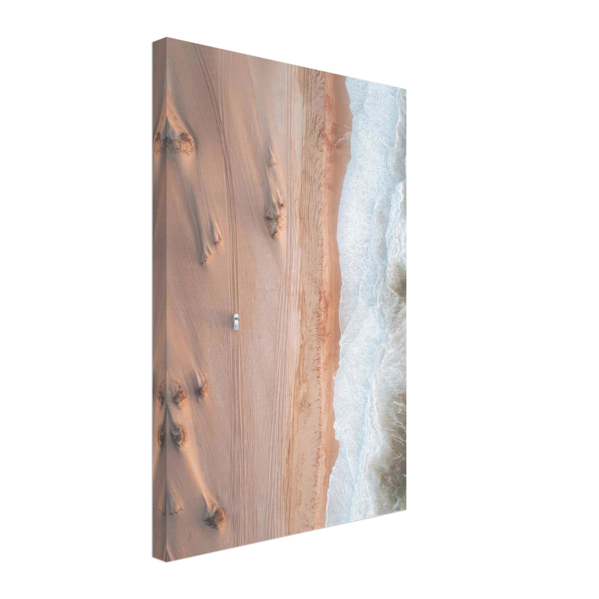 Drone photography canvas print of desert sands meeting ocean waves, showcasing vibrant textures and colors.
