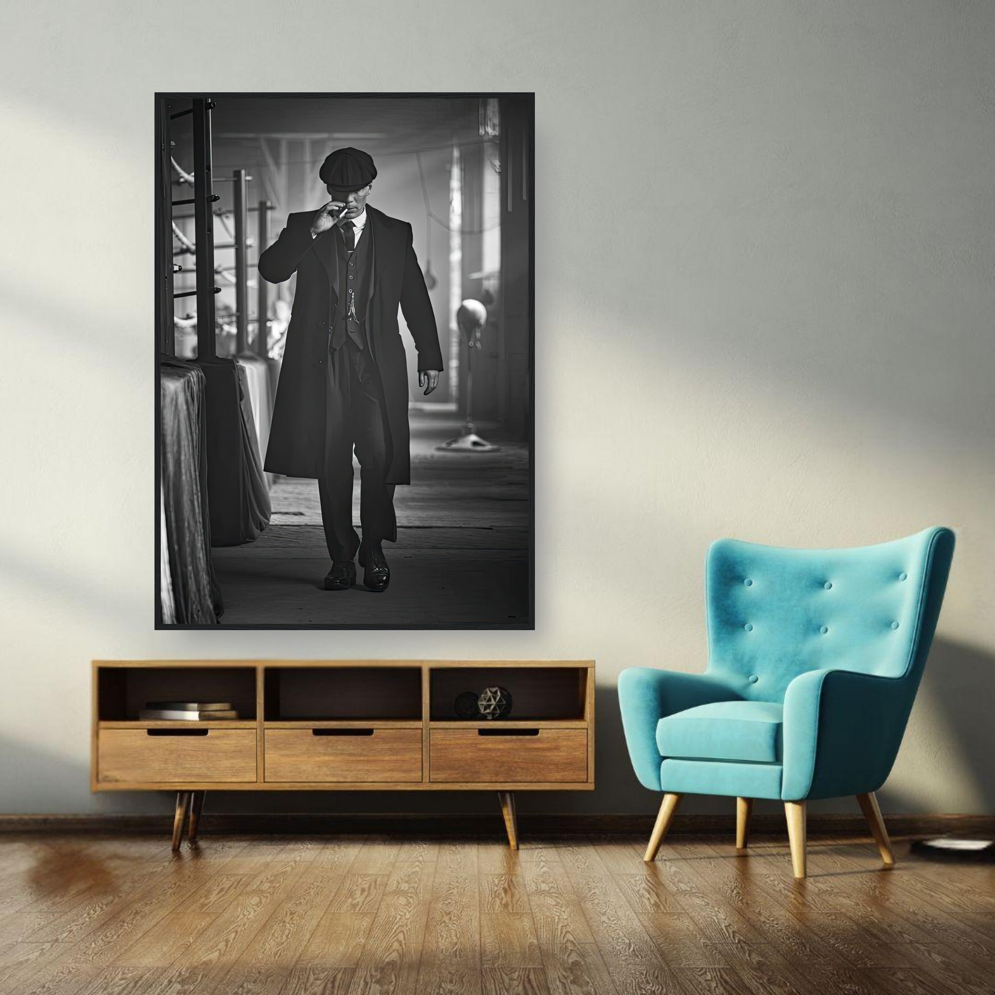 Framed print of Tommy Shelby from Peaky Blinders in a stylish room with a retro chair.