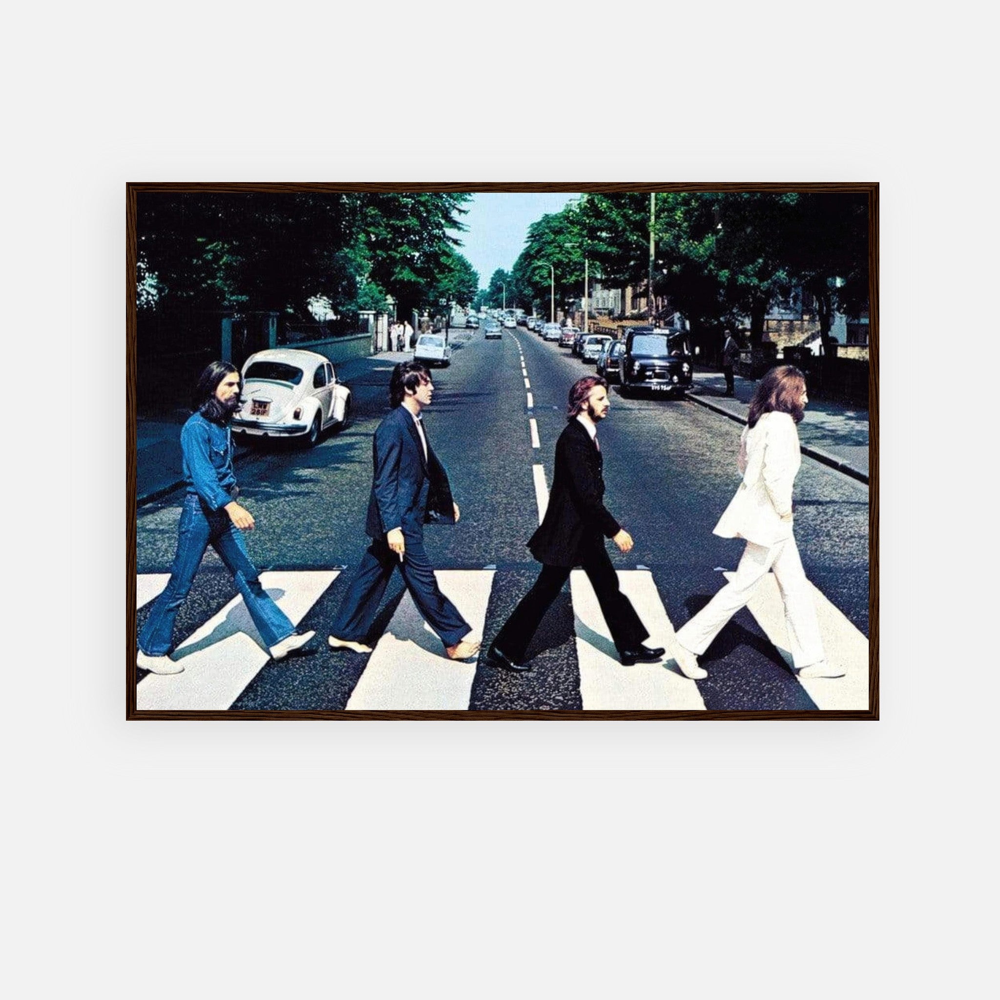 The Beatles Abbey Road Framed Print featuring iconic pedestrian crossing scene.