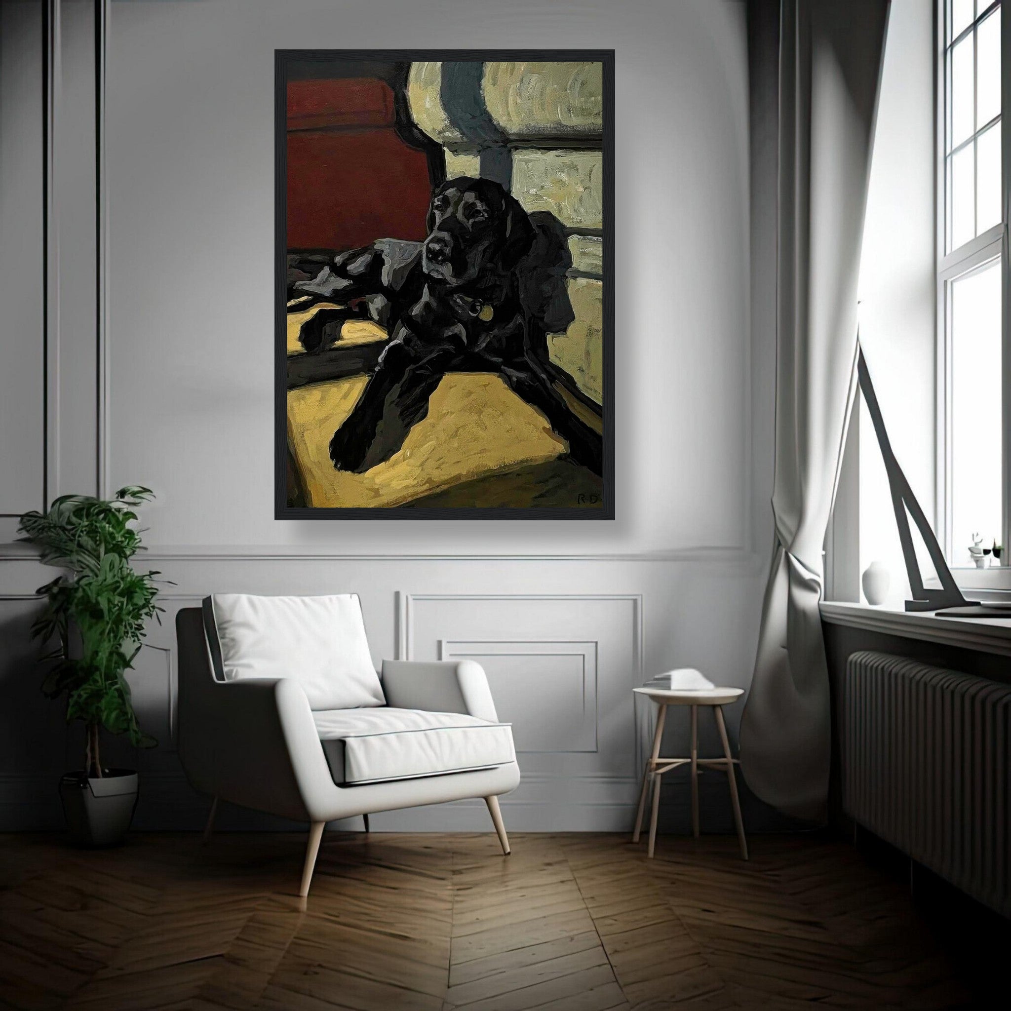 Framed print of a black Labrador dog lounging in a cozy setting, enhancing home decor with warmth and personality.