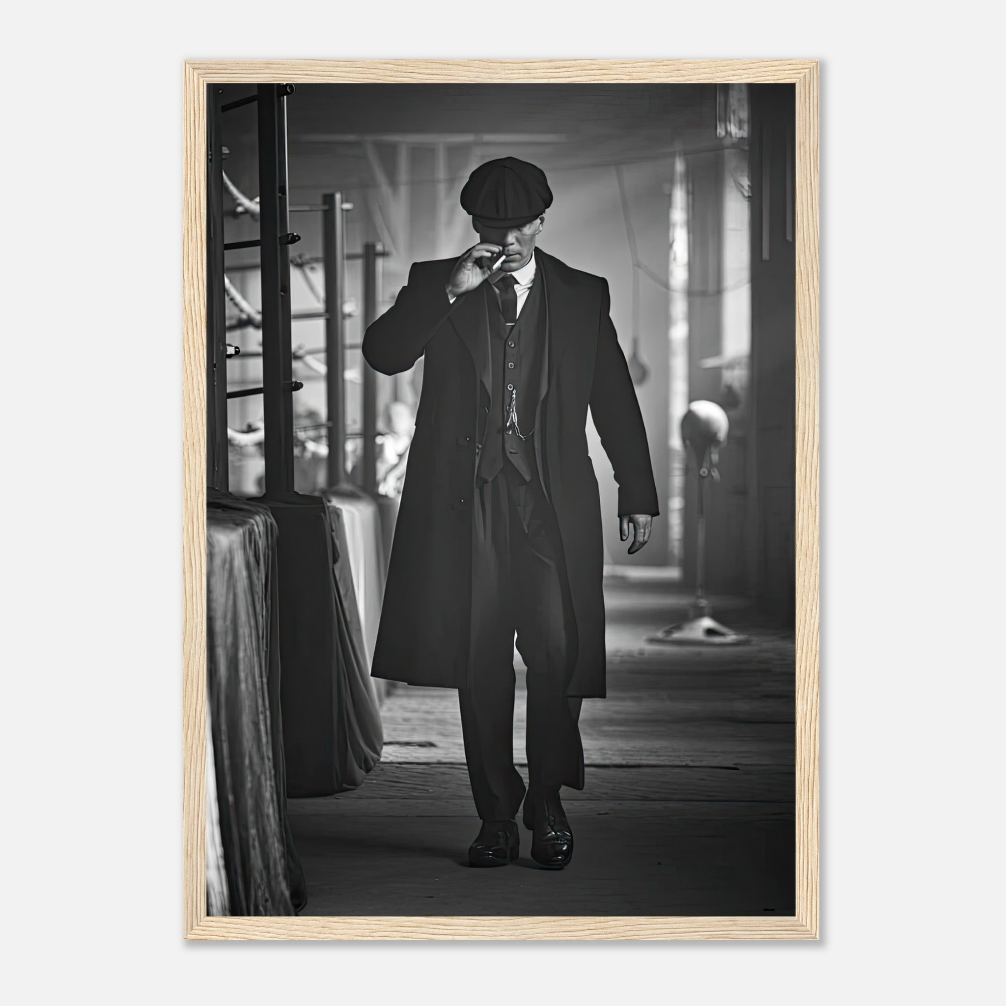 Tommy Shelby framed print from Peaky Blinders, showcasing 1920s style with flat cap and tailored overcoat.