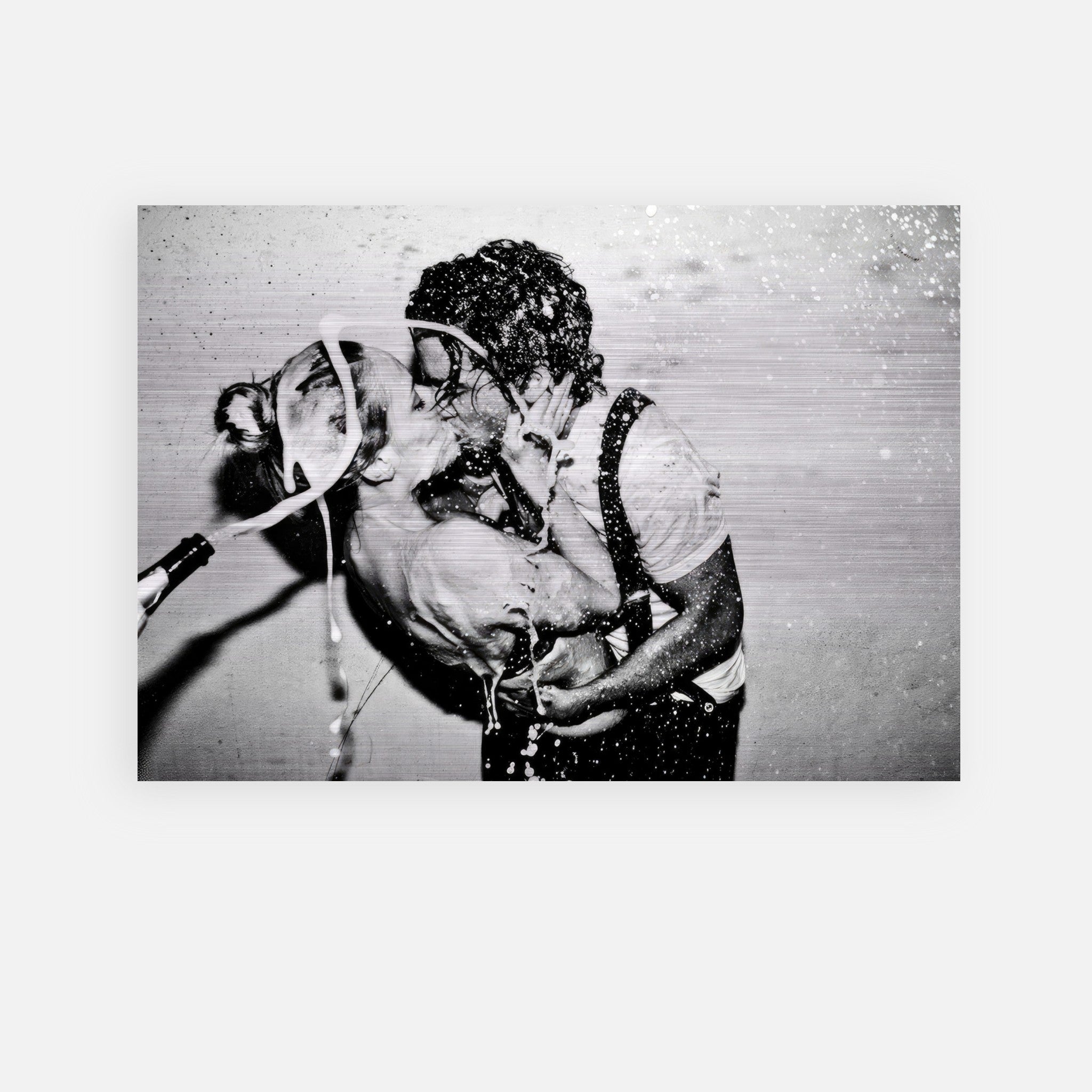 The Champagne Kiss brushed metal print featuring Johnny Depp and Kate Moss in a passionate embrace.