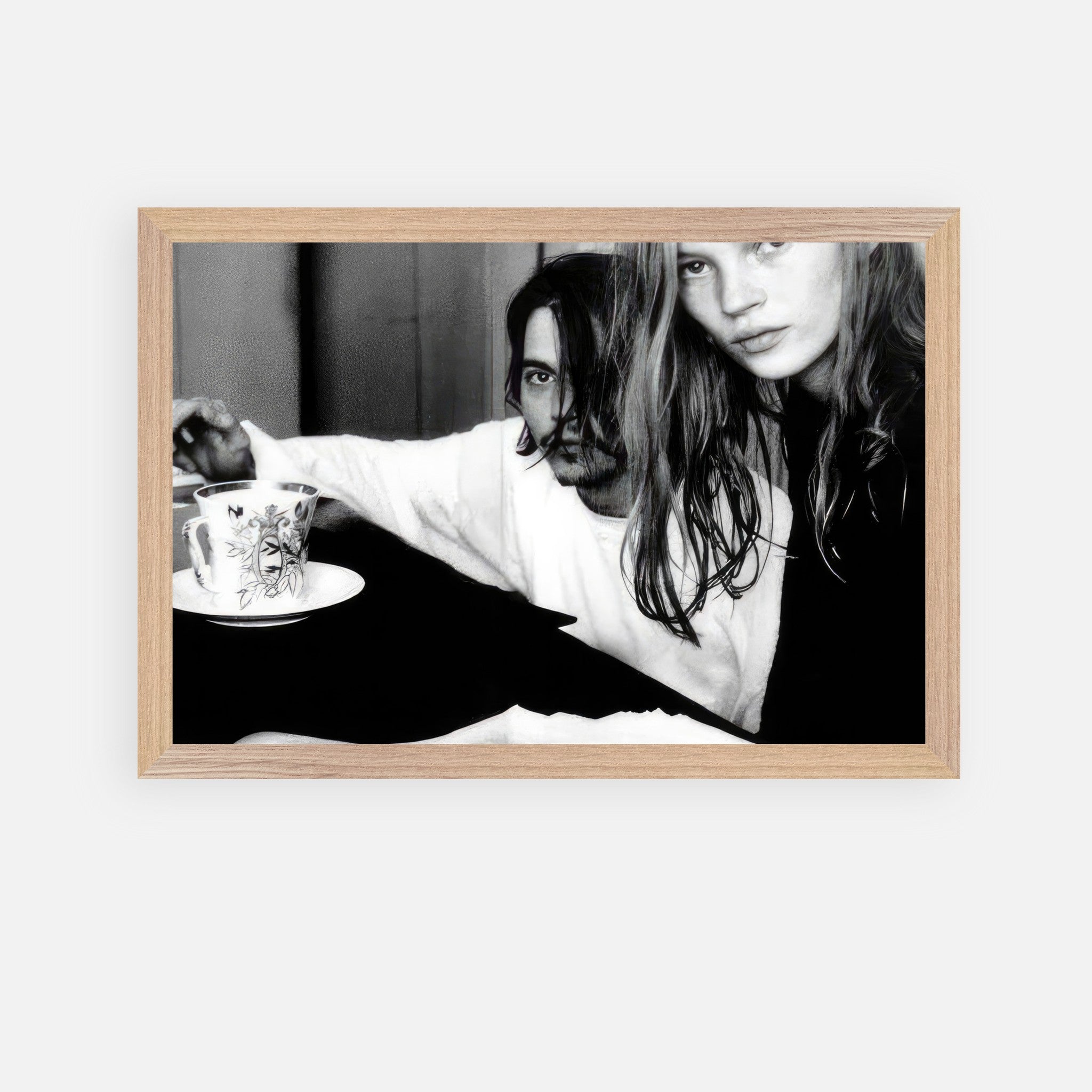 Fine art print of Johnny Depp and Kate Moss in black-and-white, capturing 90s romance, by photographer François-Marie Banier.