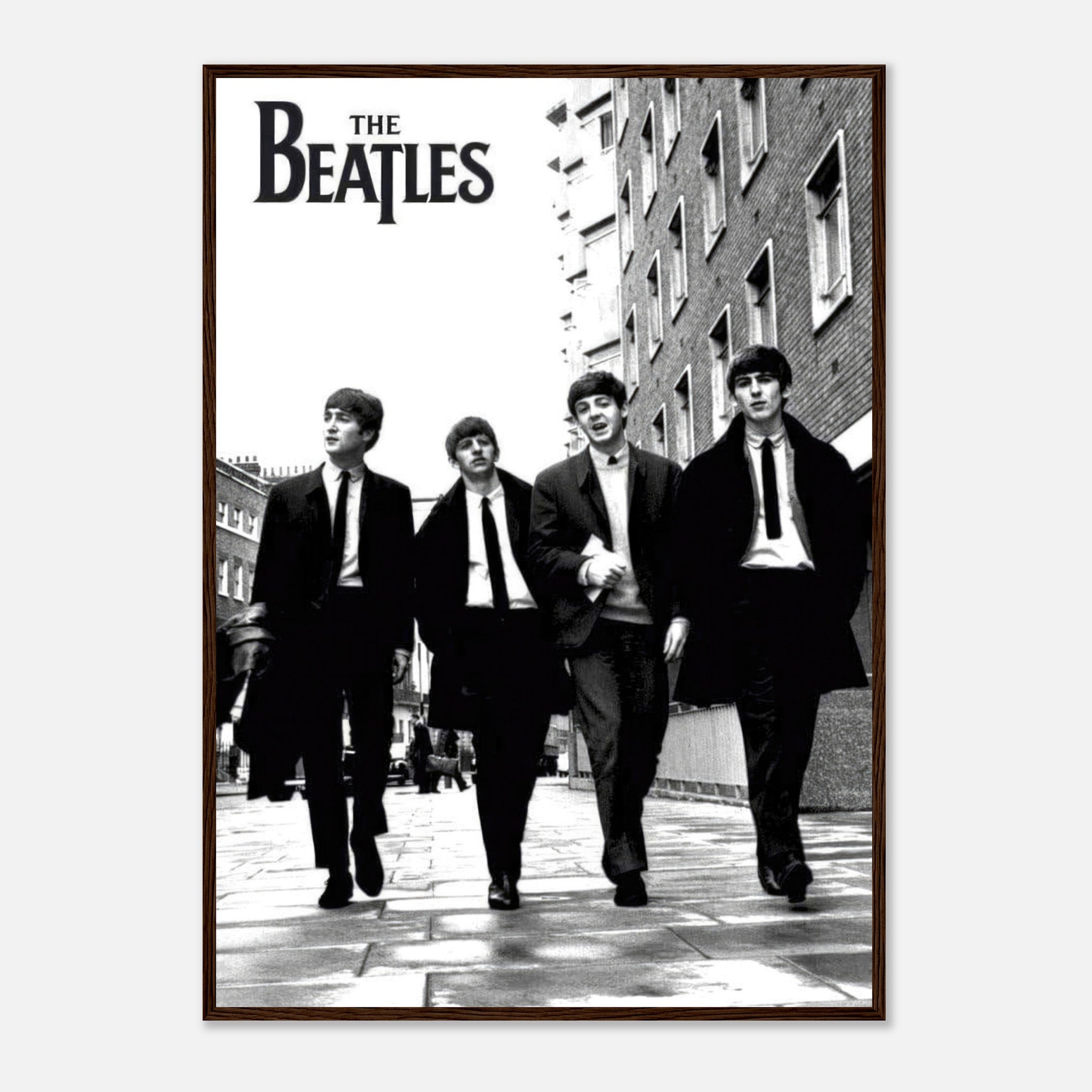 Framed print of The Beatles walking together, featuring iconic black and white photography style with the band name.