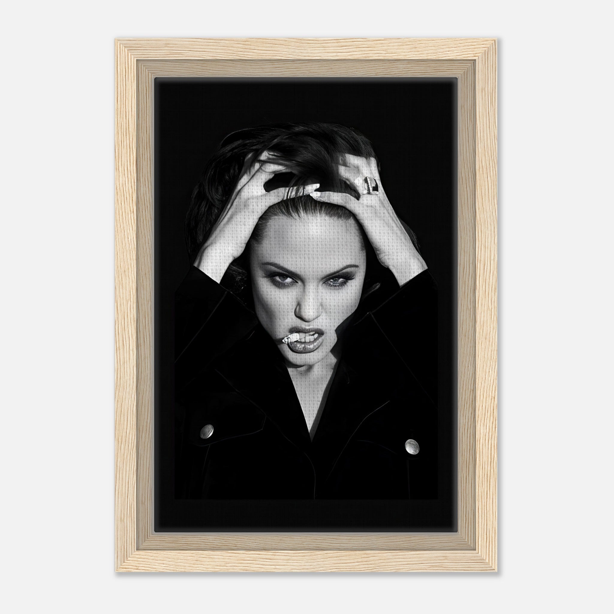 Angelina Jolie framed canvas print showcasing an elegant yet rebellious portrait in black and white.