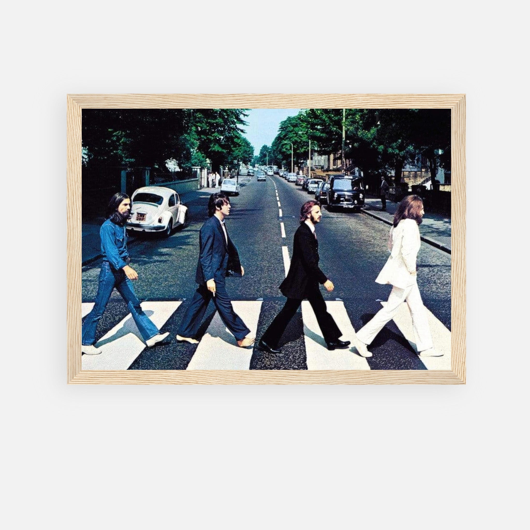 The Beatles Abbey Road framed print featuring iconic image of band crossing the street on a zebra crossing.