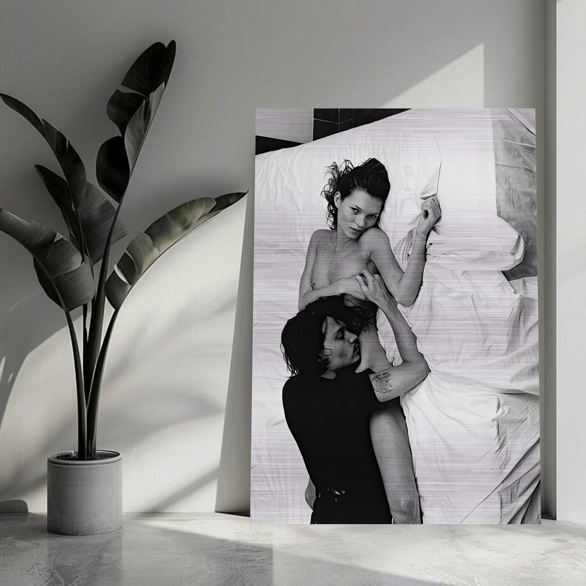 Brushed metal print of Kate Moss and Johnny Depp, capturing 90s romance and rebellion in black-and-white.