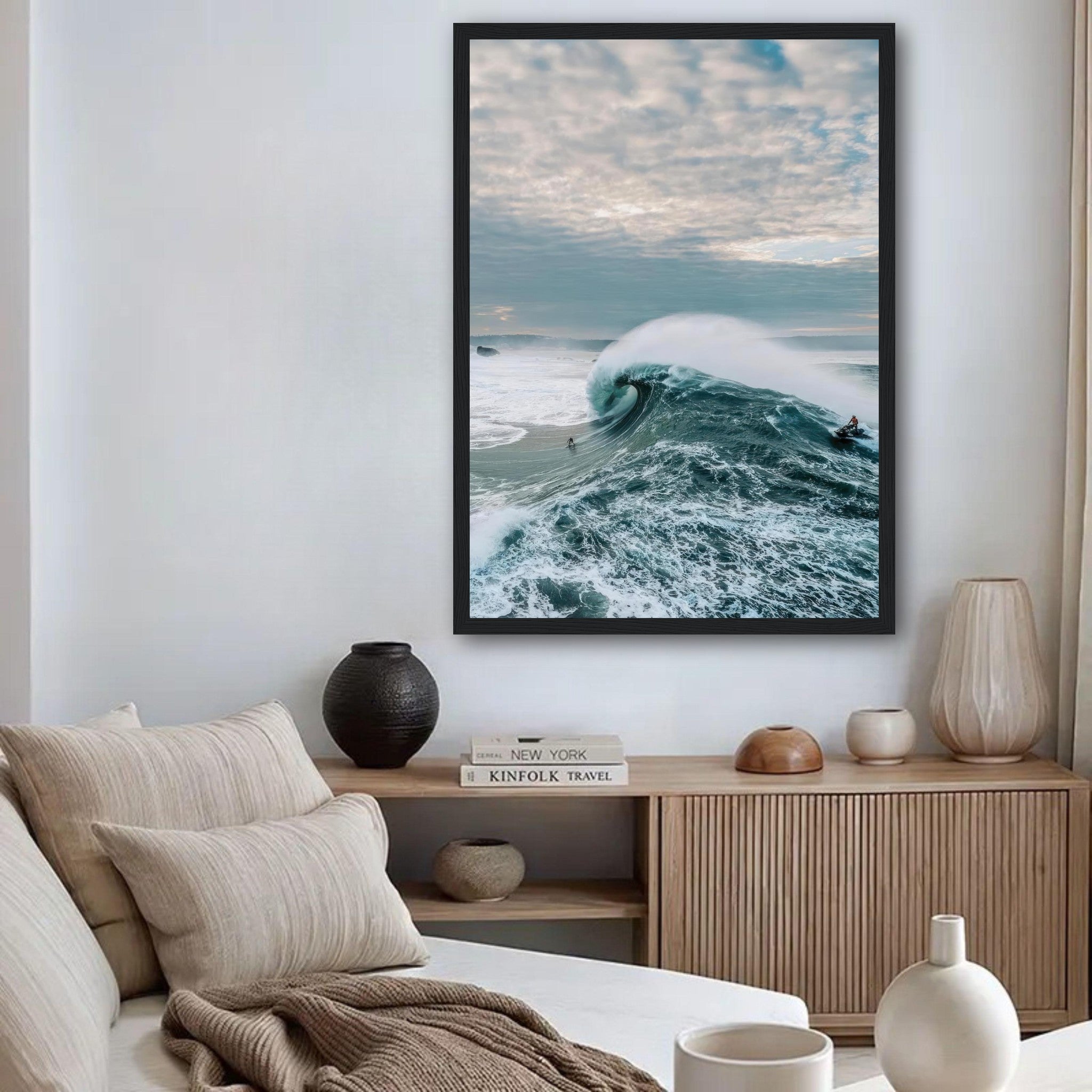 Big Wave Surfing Framed Print showcasing a surfer riding a massive wave in a stylish interior setting.