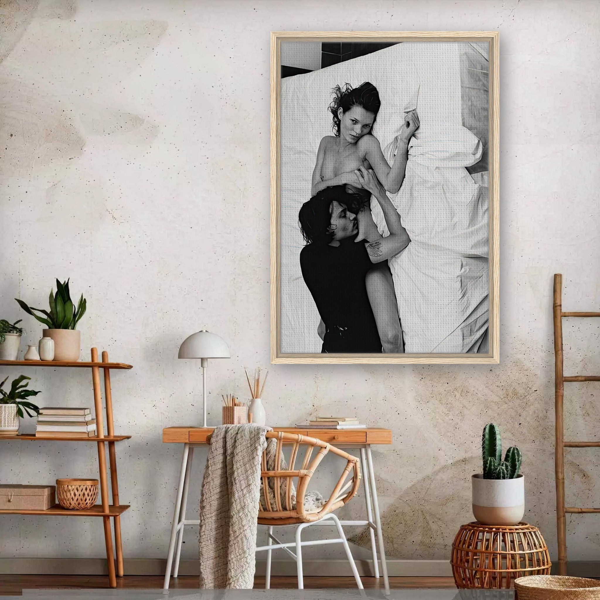 Framed canvas print of Kate Moss and Johnny Depp in an intimate embrace, capturing 1994 romance by Annie Leibovitz.