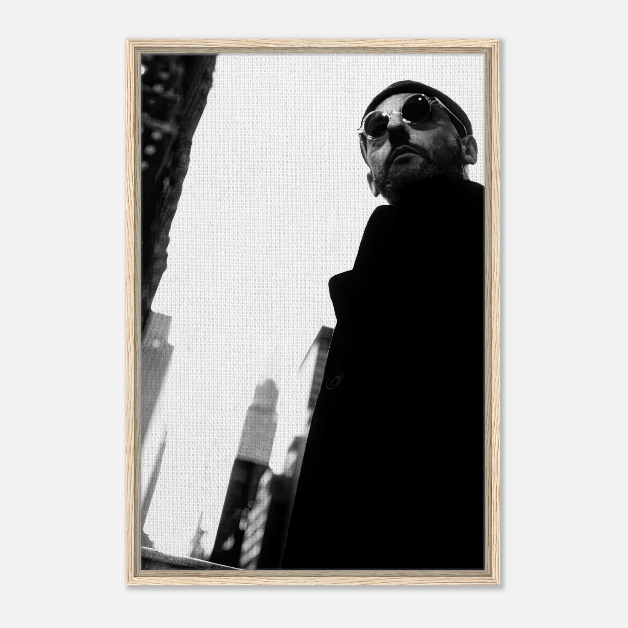 Black-and-white framed canvas print of Jean Reno, showcasing urban sophistication and iconic style.