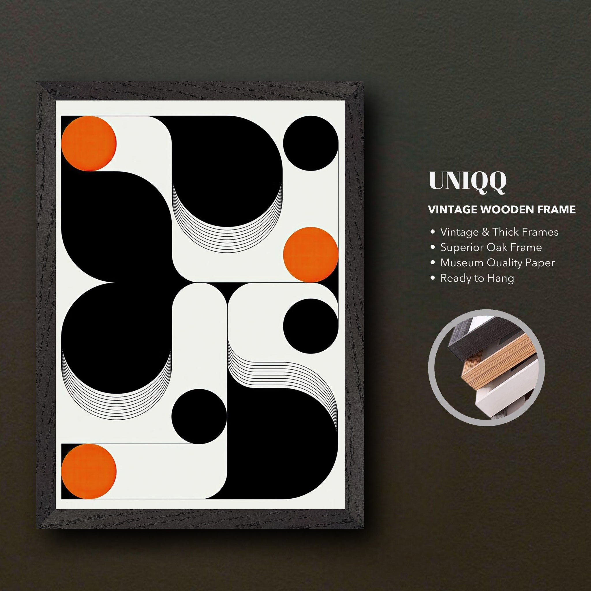 Modern geometric abstract art print with black shapes and orange circles in a vintage wooden frame.