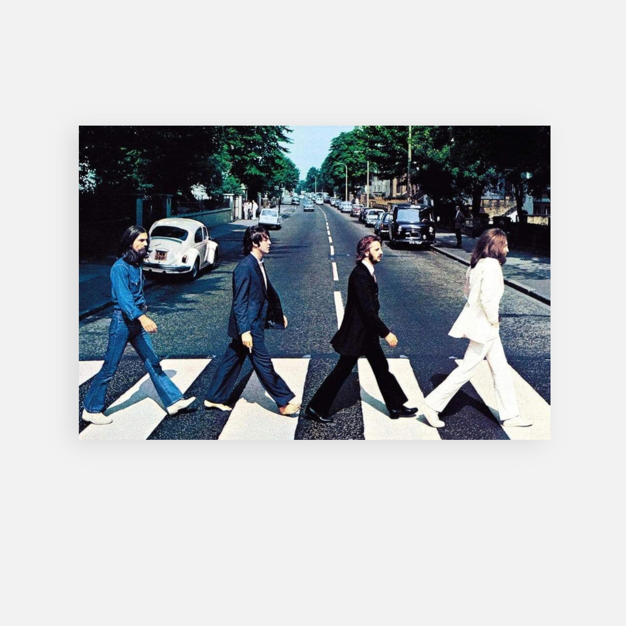 The Beatles Abbey Road metal print featuring iconic street crossing scene with all four band members.