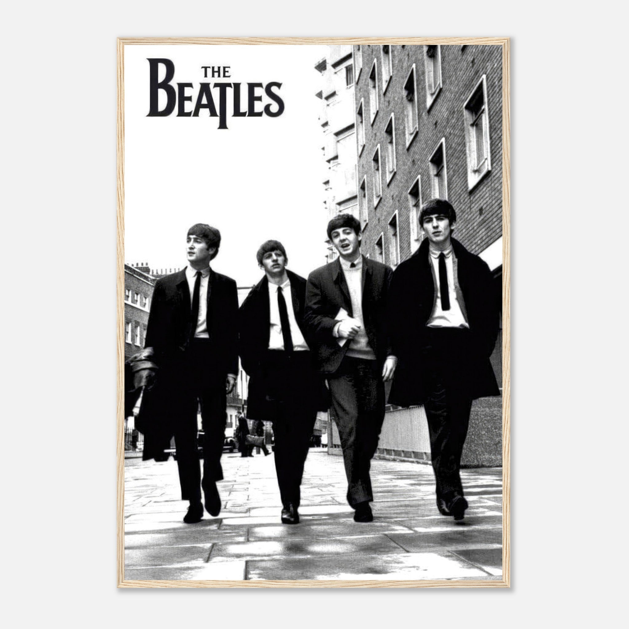 The Beatles cover framed print featuring the iconic band walking in black and white.
