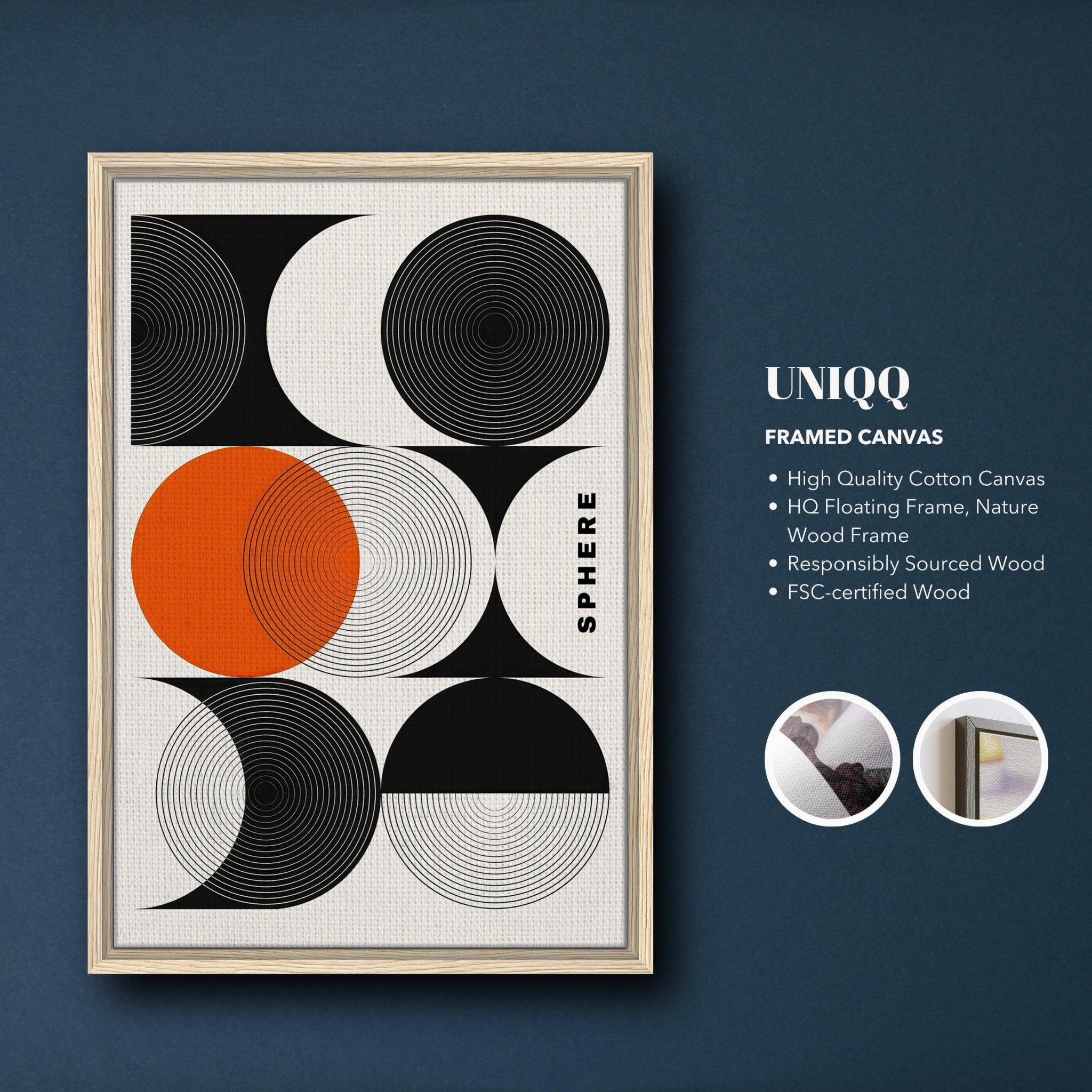 Framed canvas print of abstract geometric sphere art featuring bold black, white, and orange circular designs.