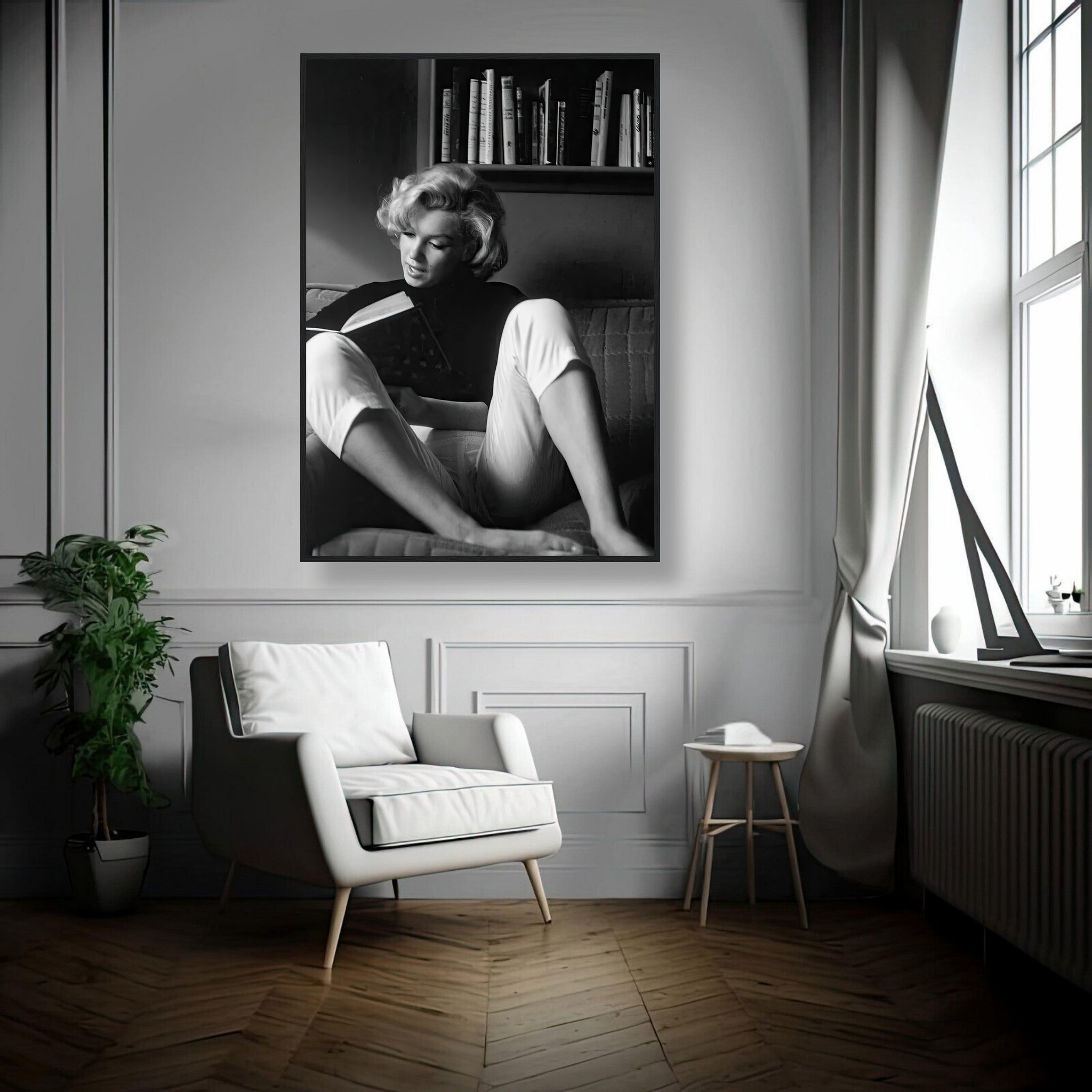 Marilyn Monroe framed print of her reading at home, showcasing classic Hollywood elegance in black-and-white.