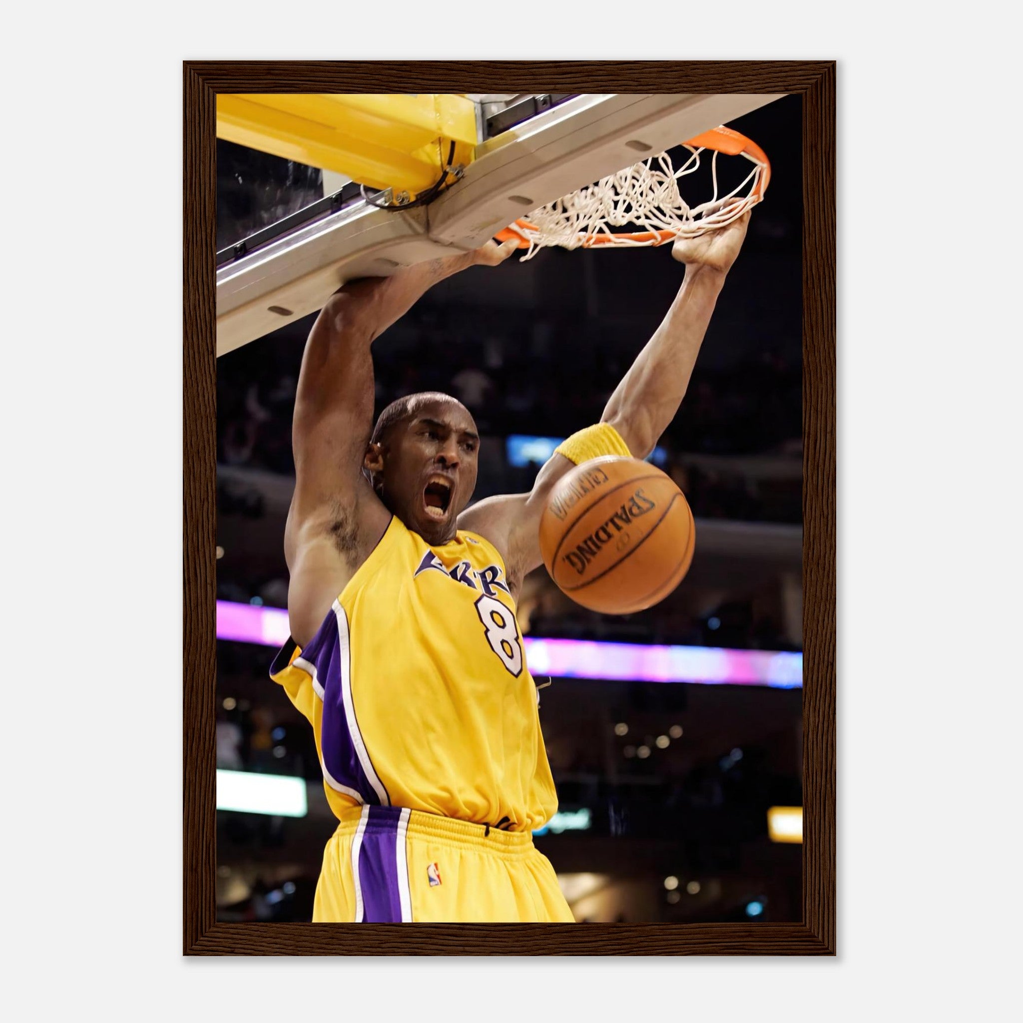 Kobe Bryant's iconic slam dunk framed print, showcasing his intensity in Lakers colors.
