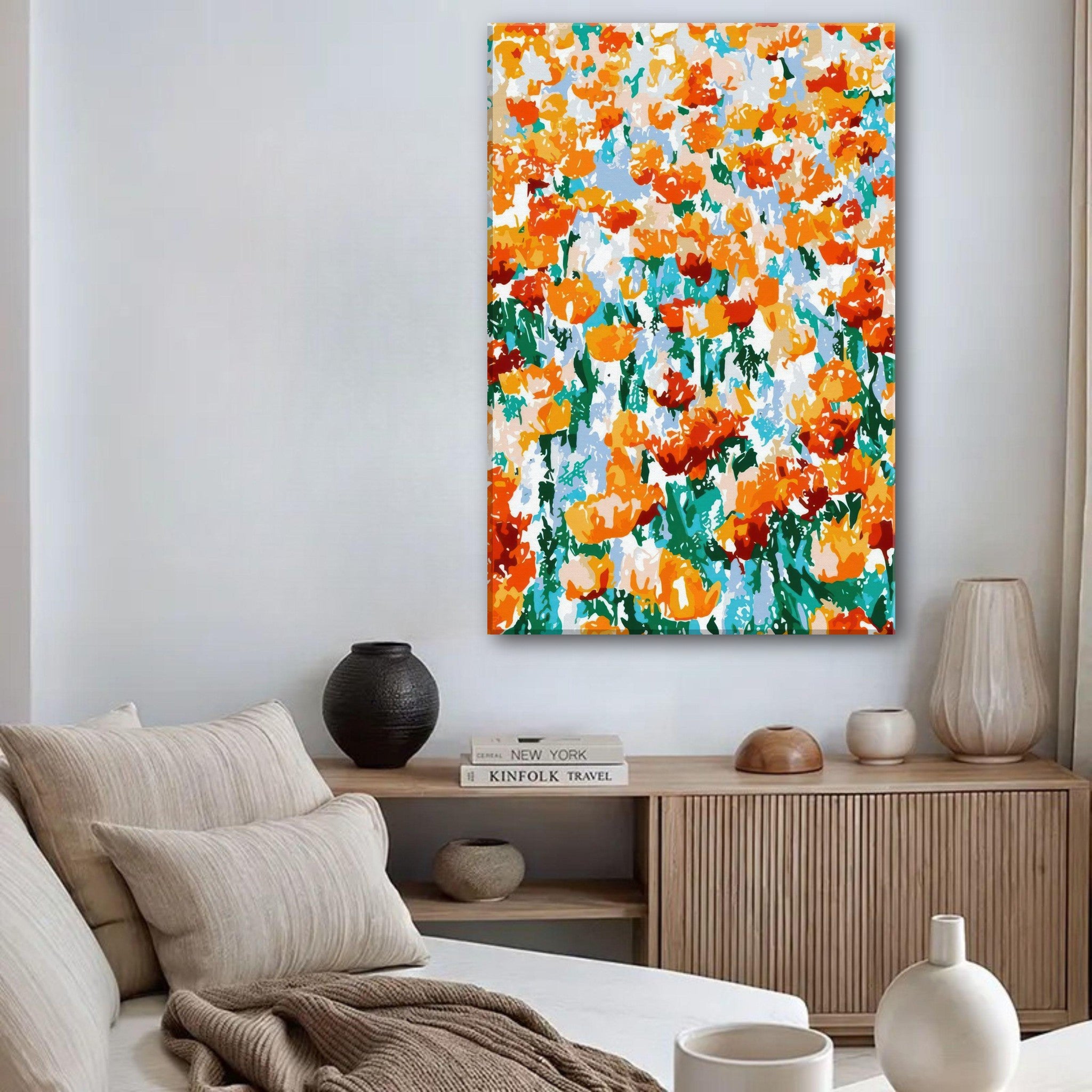 Vibrant Abstract Floral Tulip Garden Canvas Print featuring bright orange tulips against a colorful background in a cozy living room.