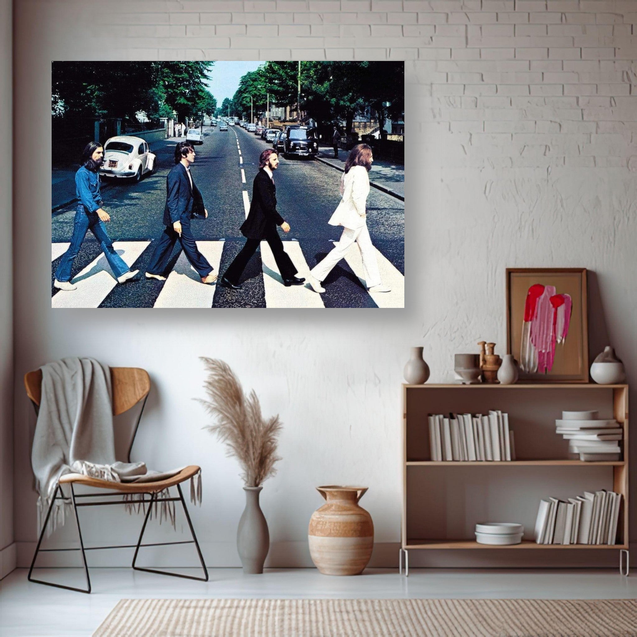 The Beatles Abbey Road metal print displayed in a modern living room with stylish decor.