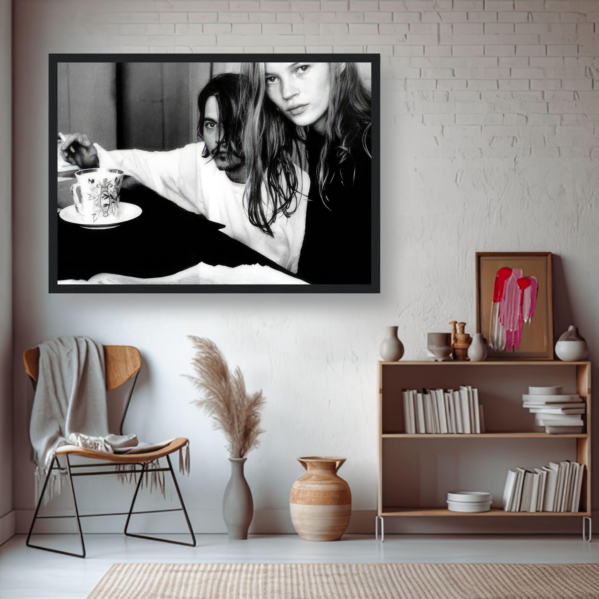 Black-and-white framed print of Johnny Depp and Kate Moss, capturing their iconic 1990s romance.