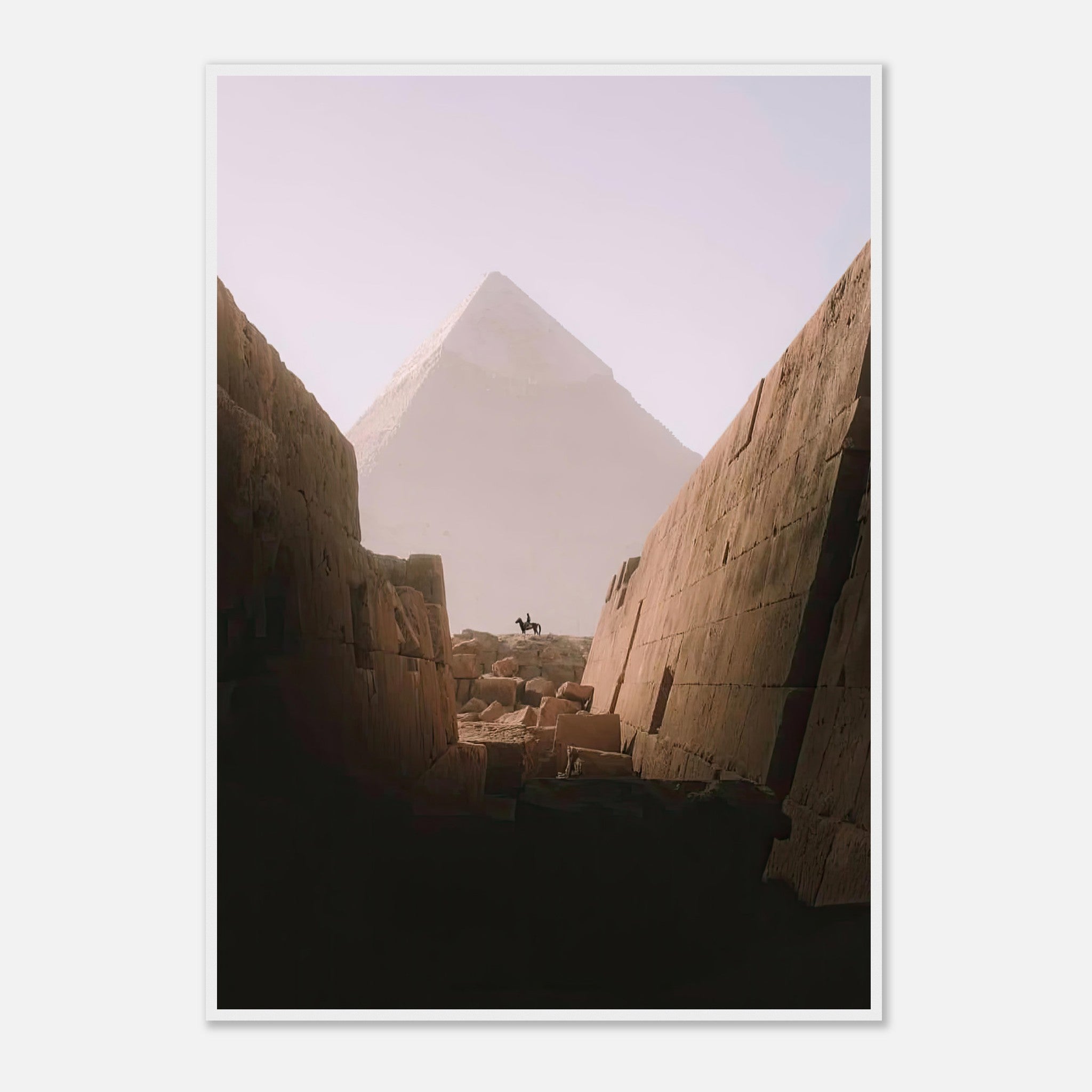 Framed print of a rider on horseback in front of the Great Pyramid of Giza, surrounded by ancient stone walls.