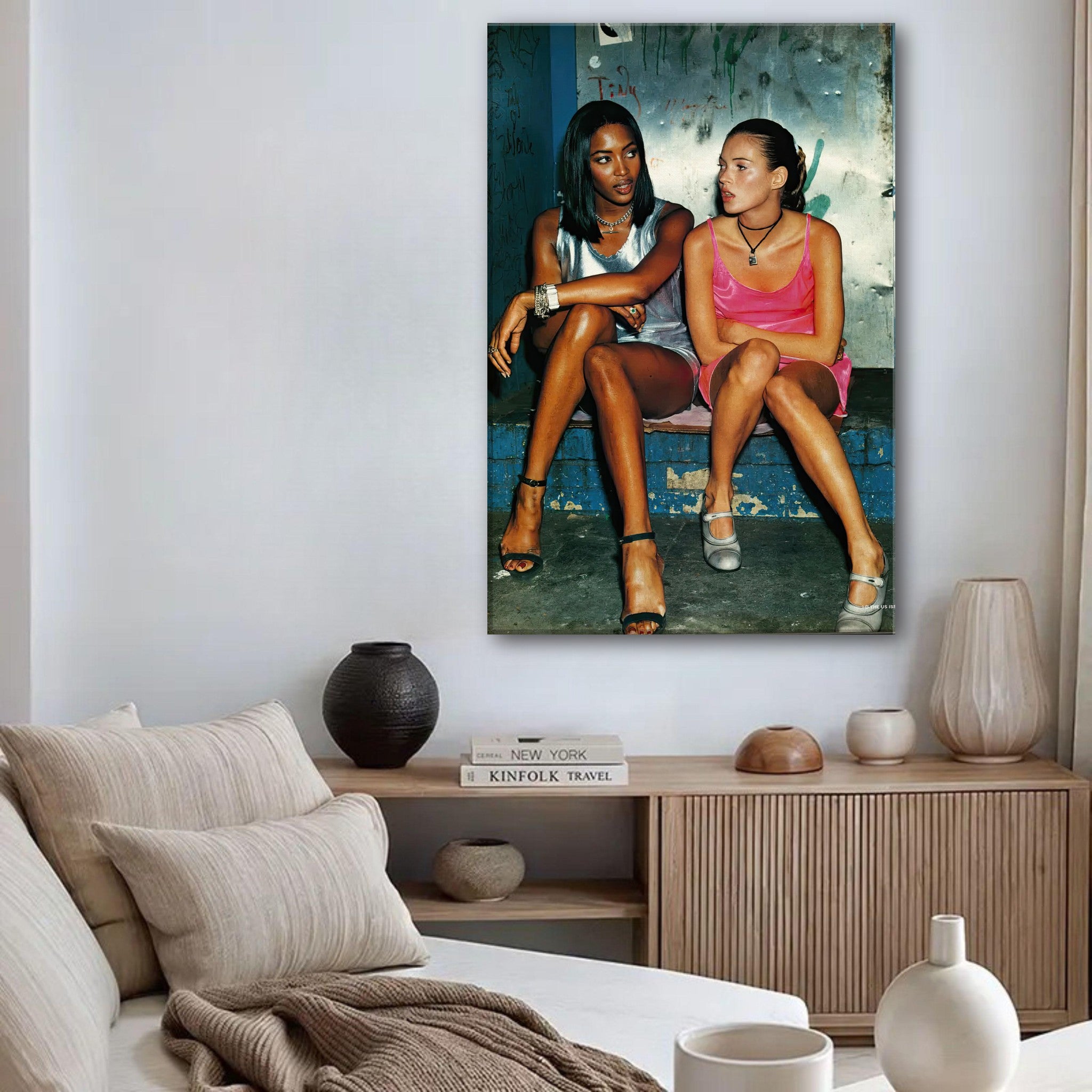 Naomi Campbell and Kate Moss canvas print displayed in a stylish living room setting, highlighting 90s fashion.