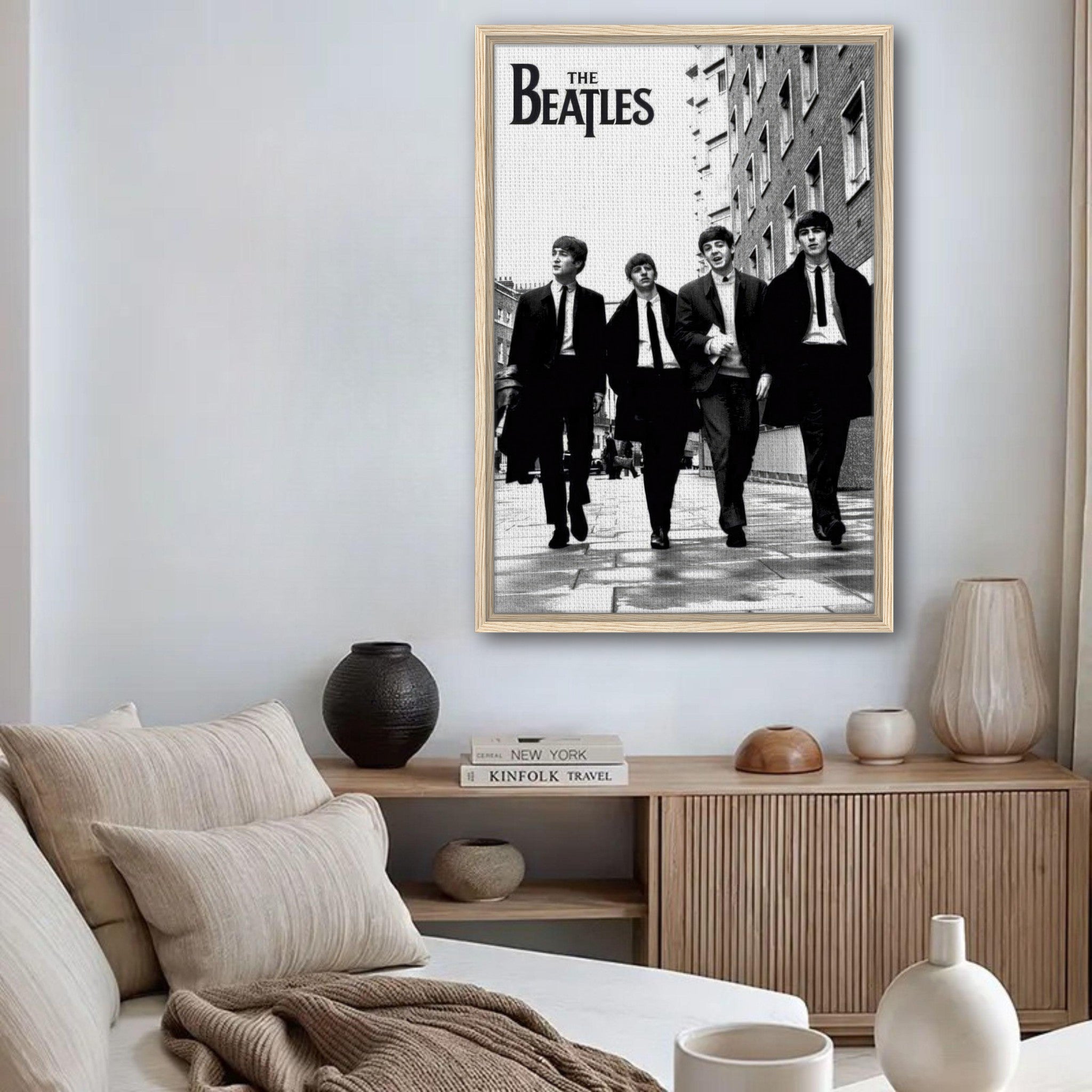 The Beatles Cover Framed Canvas Print displayed in a modern living room setting with stylish decor.