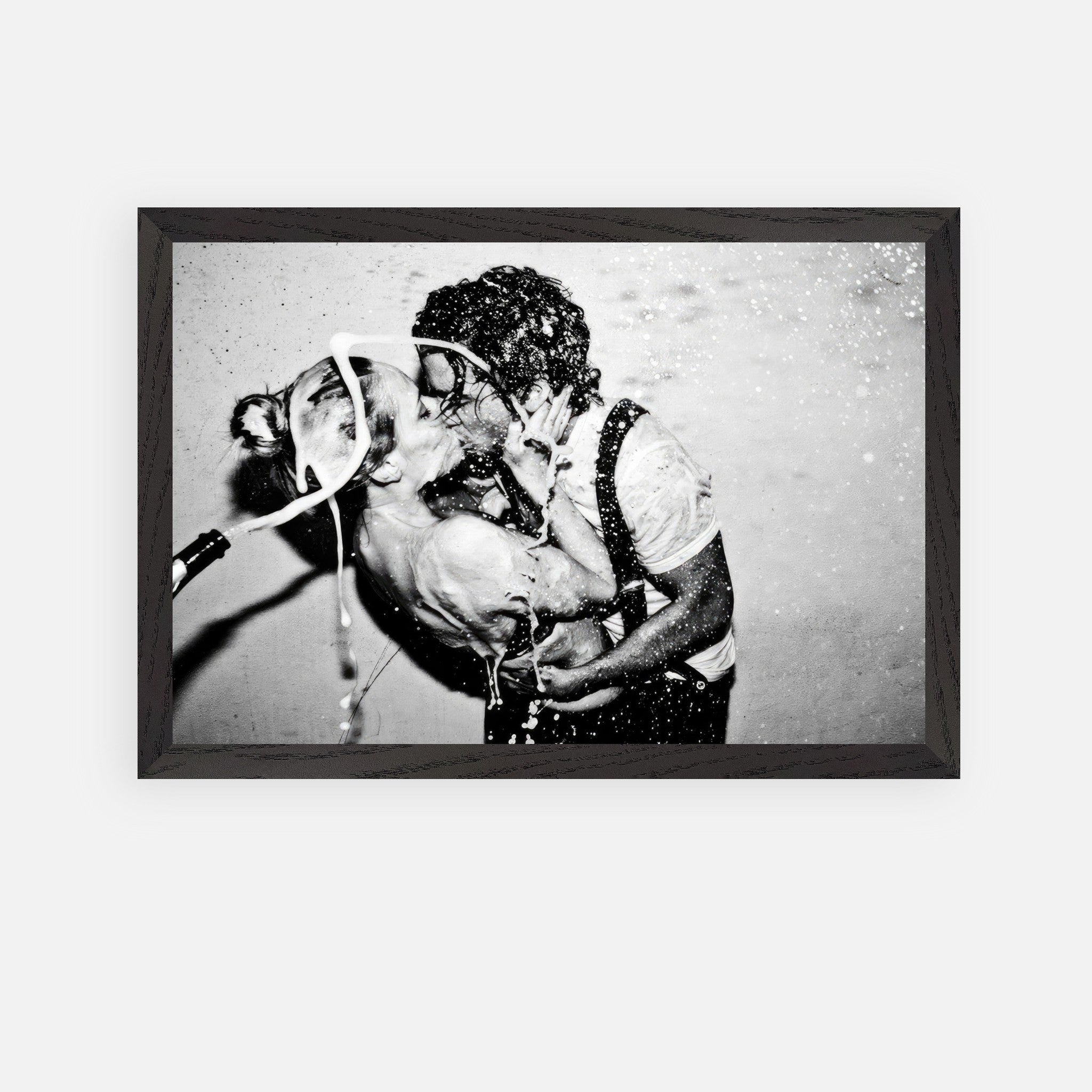 The Champagne Kiss fine art print of Johnny Depp and Kate Moss in black-and-white, capturing passion and romance.