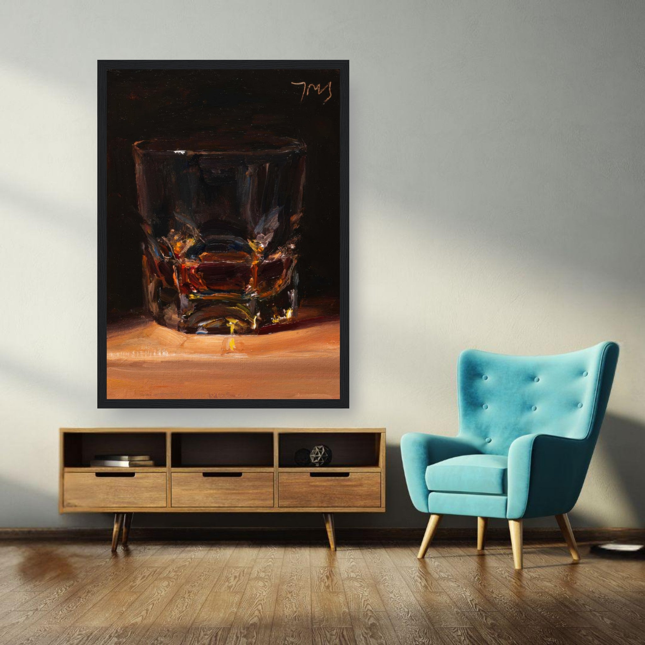 Whiskey framed print showcasing a glass with deep amber tones, set in a modern living space.