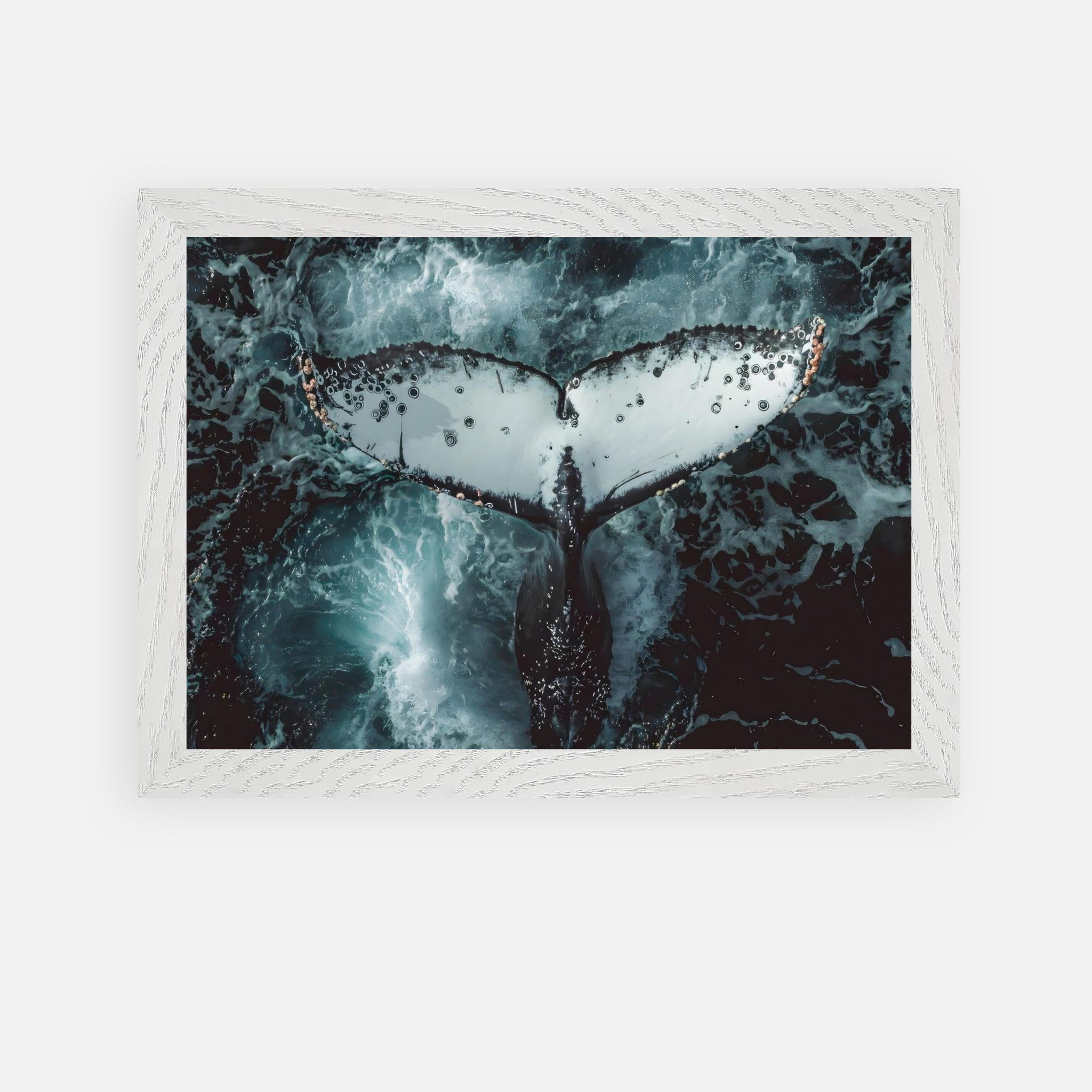 Humpback whale framed art depicting a whale tail emerging from ocean waves in vivid detail.
